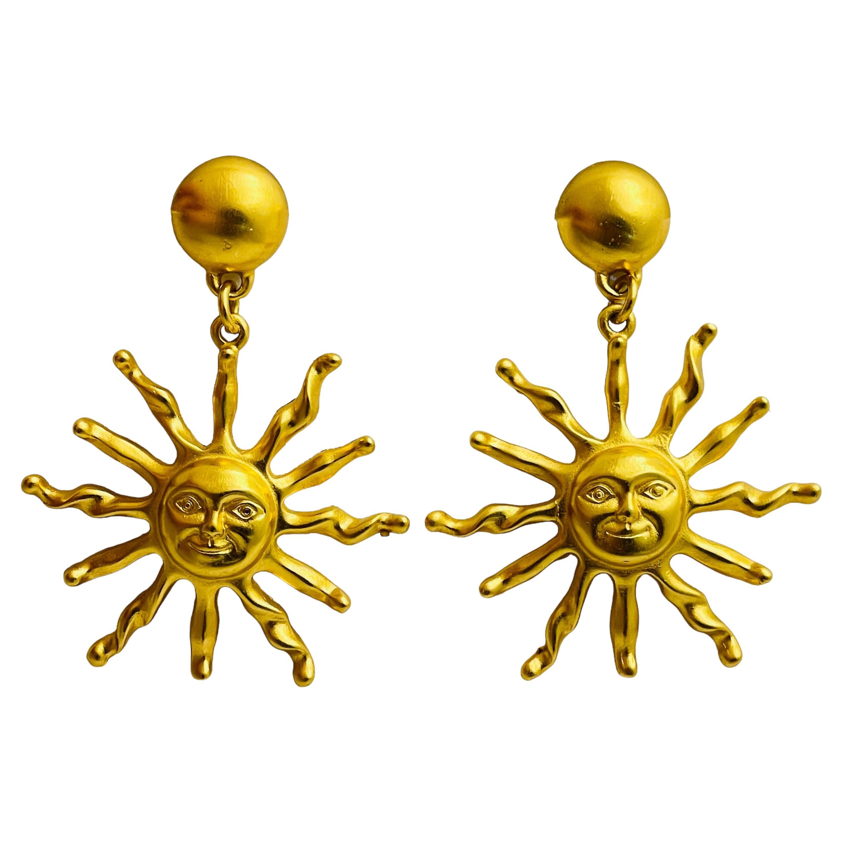 ANNE KLEIN sun face matte gold tone designer dangle earrings For Sale