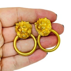 Boucles d'oreilles vintage Anne Klein en forme de tête de lion, couleur or, ajourées