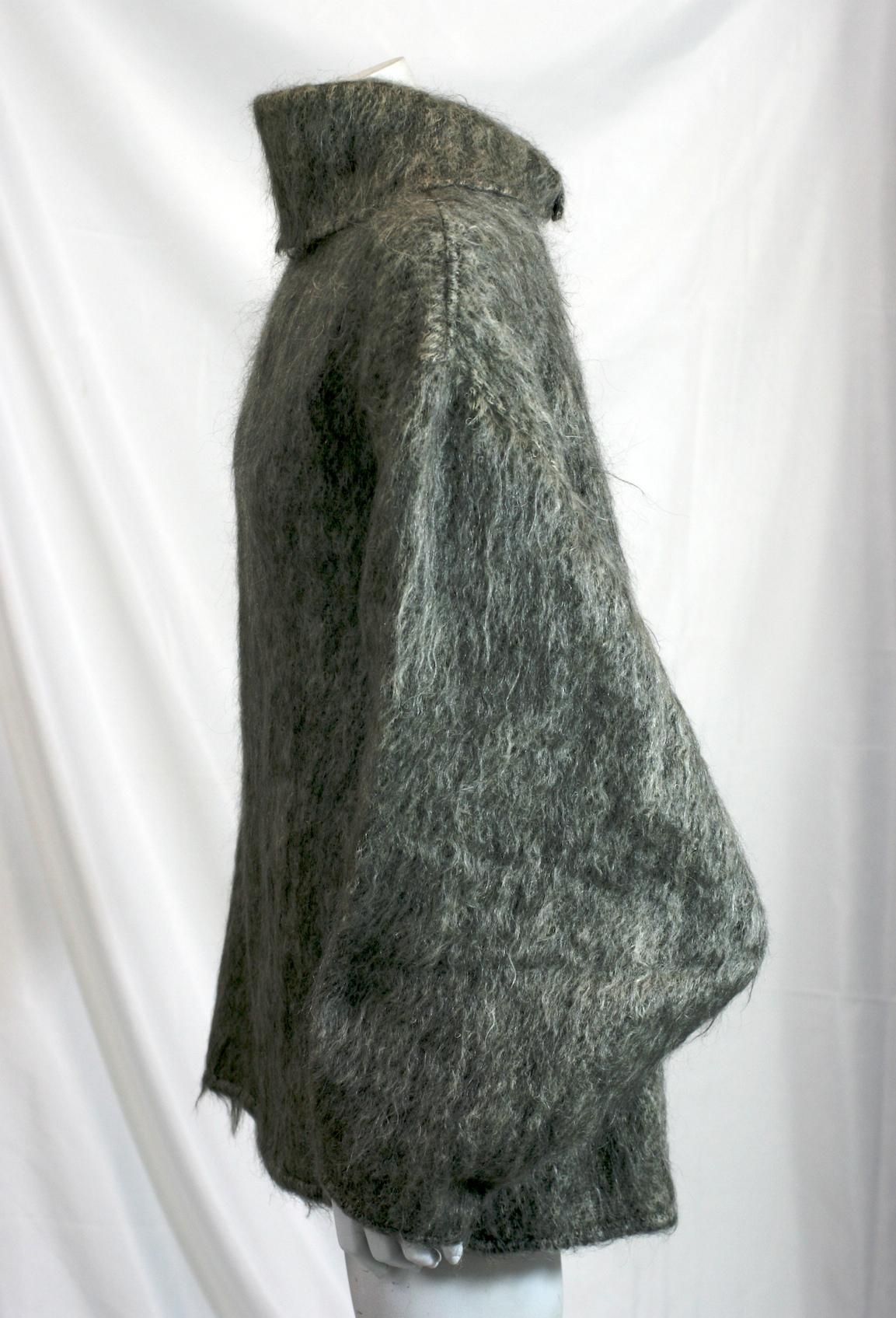 Anne Marie Beretta Brushed Grey Mohair Blouse from the 1980's. Large collar with deep sleeves with signature pointed elbow cuts. Black grosgrain with snap fittings on back closure. Collar has snaps at base to from a high or open collar. Blouse can