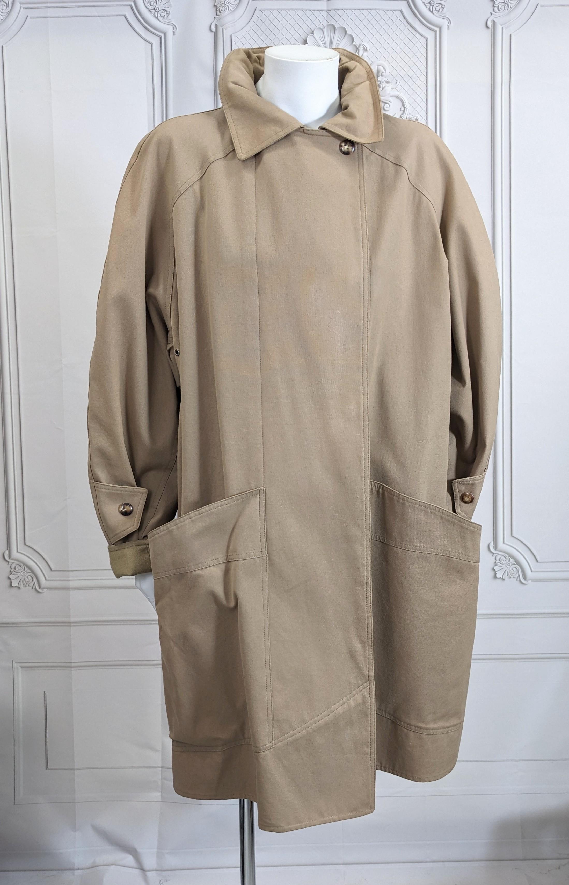Anne Marie Beretta Wool Lined Brushed Cotton Twill Coat from the 1980's France. Oversized cut with massive signature pockets which reach to hem. Signature Horn covered snaps are used to close coat. Brushed cotton completely back in wool melton. Deep