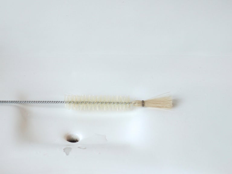 Anne Mourier Figurative Photograph - White Goods #1 (Little Brush)