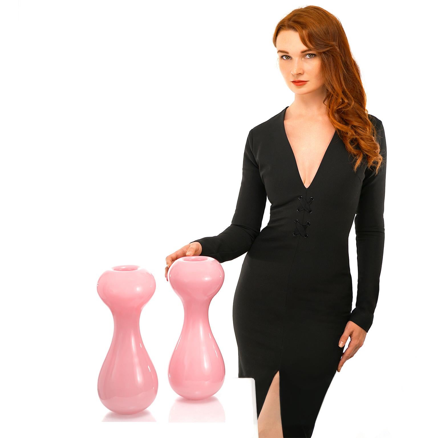 By Anne Nilsson for Kosta Boda, Sweden, circa early 2000s. This pair of brilliantly amorphous vases by the renowned Kosta Boda designer, Anne Nilsson, are redolent of 1950s modernist style. Fabulous in pink, it is a rare color and rarer still to