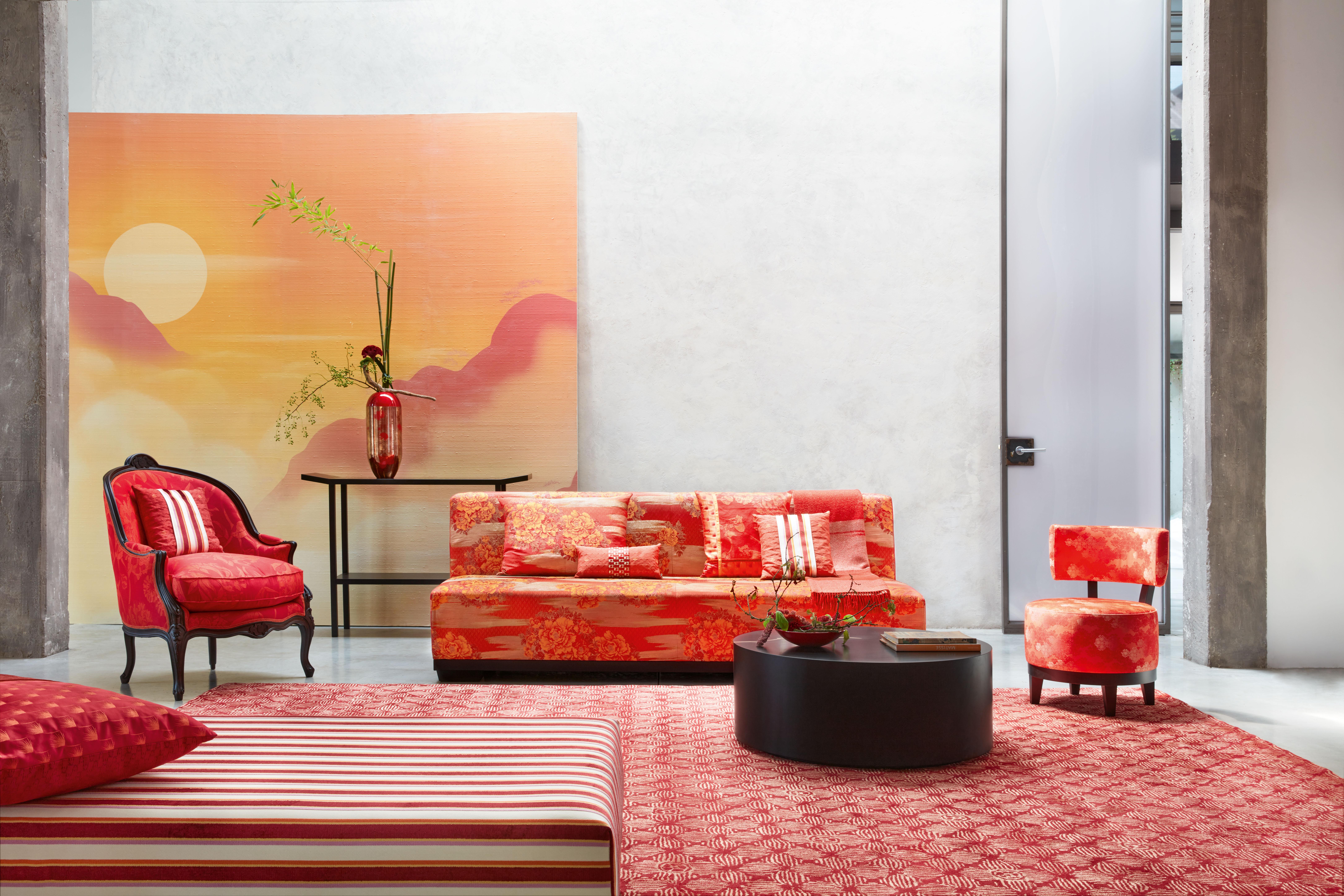 Showcasing extraordinary craftsmanship, this armchair serves as a bold and striking accent for any interior. The structure is meticulously hand-carved from solid beech and upholstered with the refined Pivoine jacquard fabric, featuring tone-on-tone