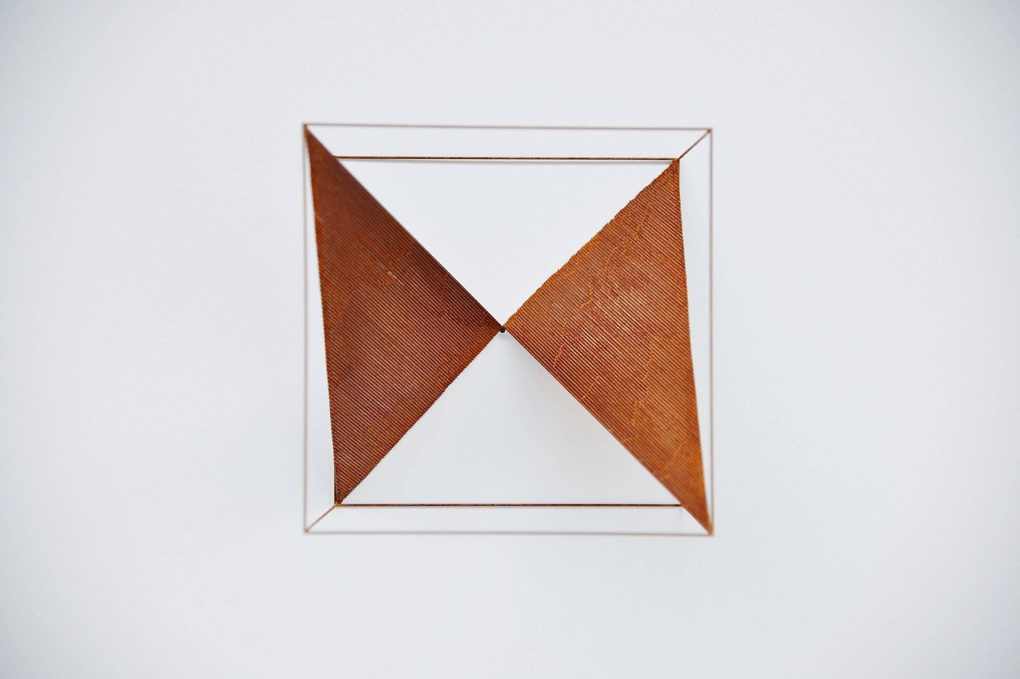 This is for a steel oxidated cube designed and made by Anne Rose Regenboog, Den Haag 2016. This cube is from a serie of four unica's made of steel and is finished with oxidation to provoke the rust process and making these metal artworks all