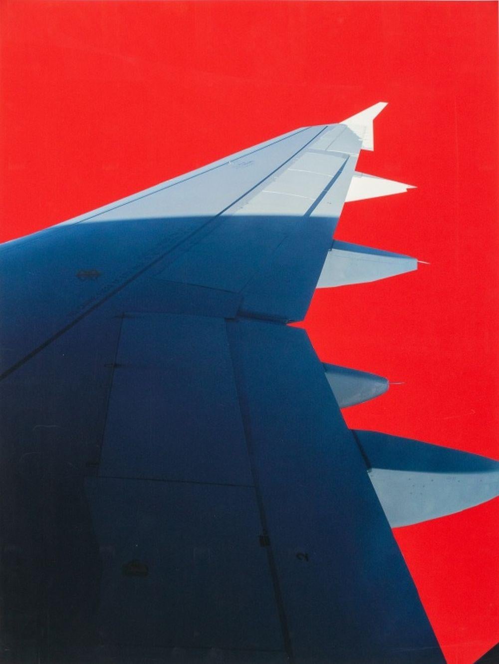 Airplane Wing in Red - Photograph by Anne Sager