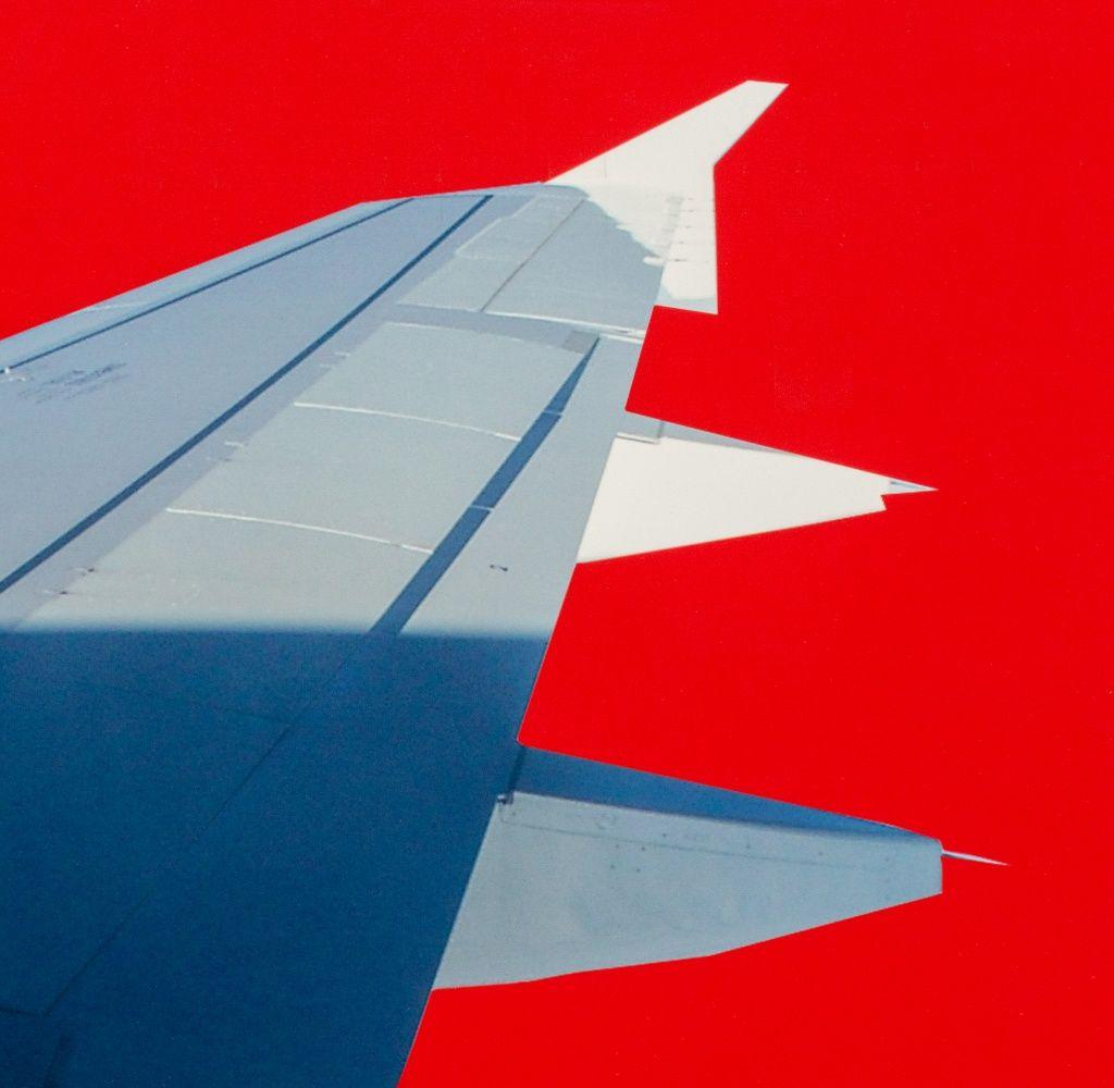 Airplane Wing in Red - Contemporary Photograph by Anne Sager