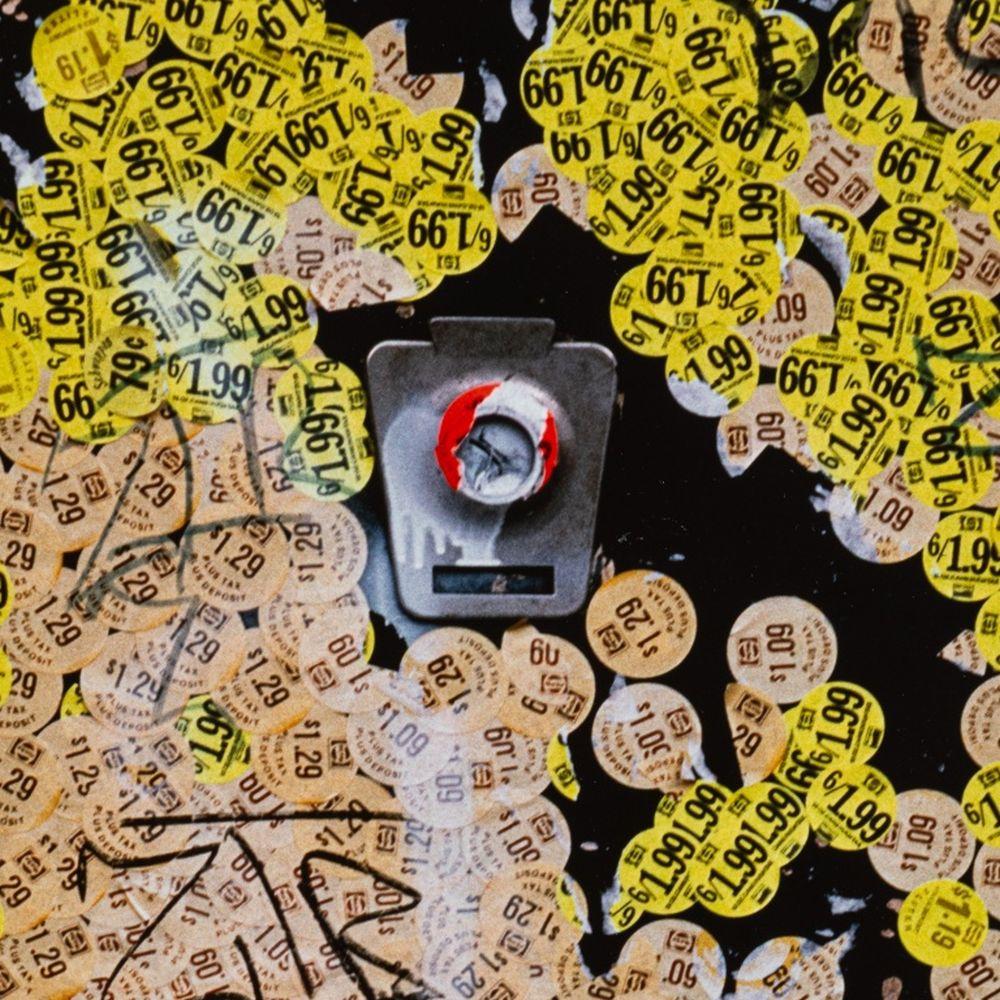 Price Sticker Graffiti - Contemporary Photograph by Anne Sager