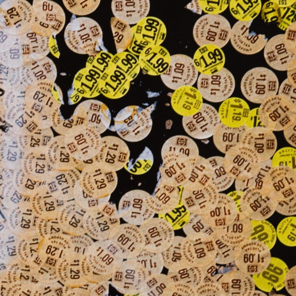 Price Sticker Graffiti - Beige Color Photograph by Anne Sager