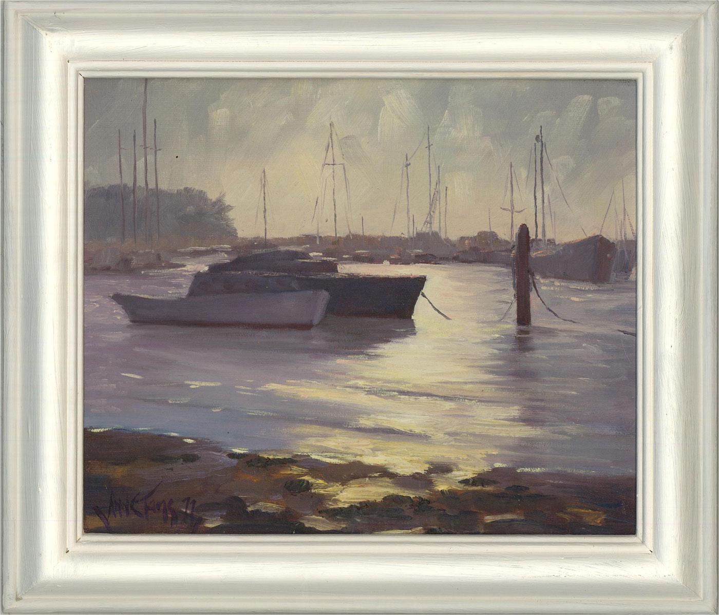 A fine and captivating oil painting by Anne Tams, depicting a coastal scene with moored boats. Signed and dated to the lower left-hand corner. Presented in a white frame. On canvas board.
