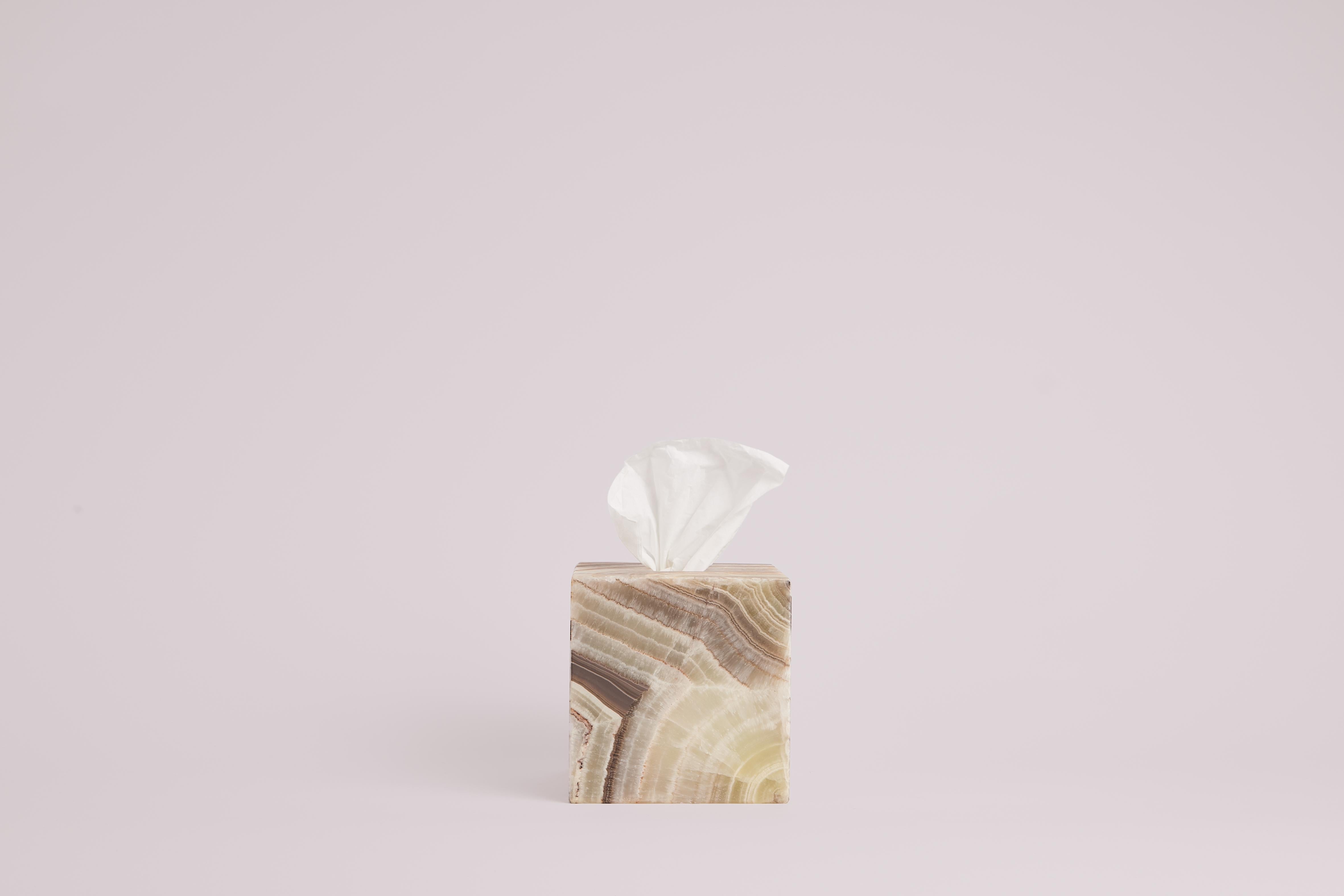 The Anne Tissue Box in Red Onyx, designed by Studio Gaïa, is a stylish and functional accessory designed to add a touch of sophistication to any space. Made from high-quality red onyx, this tissue box combines the natural beauty of the stone with a