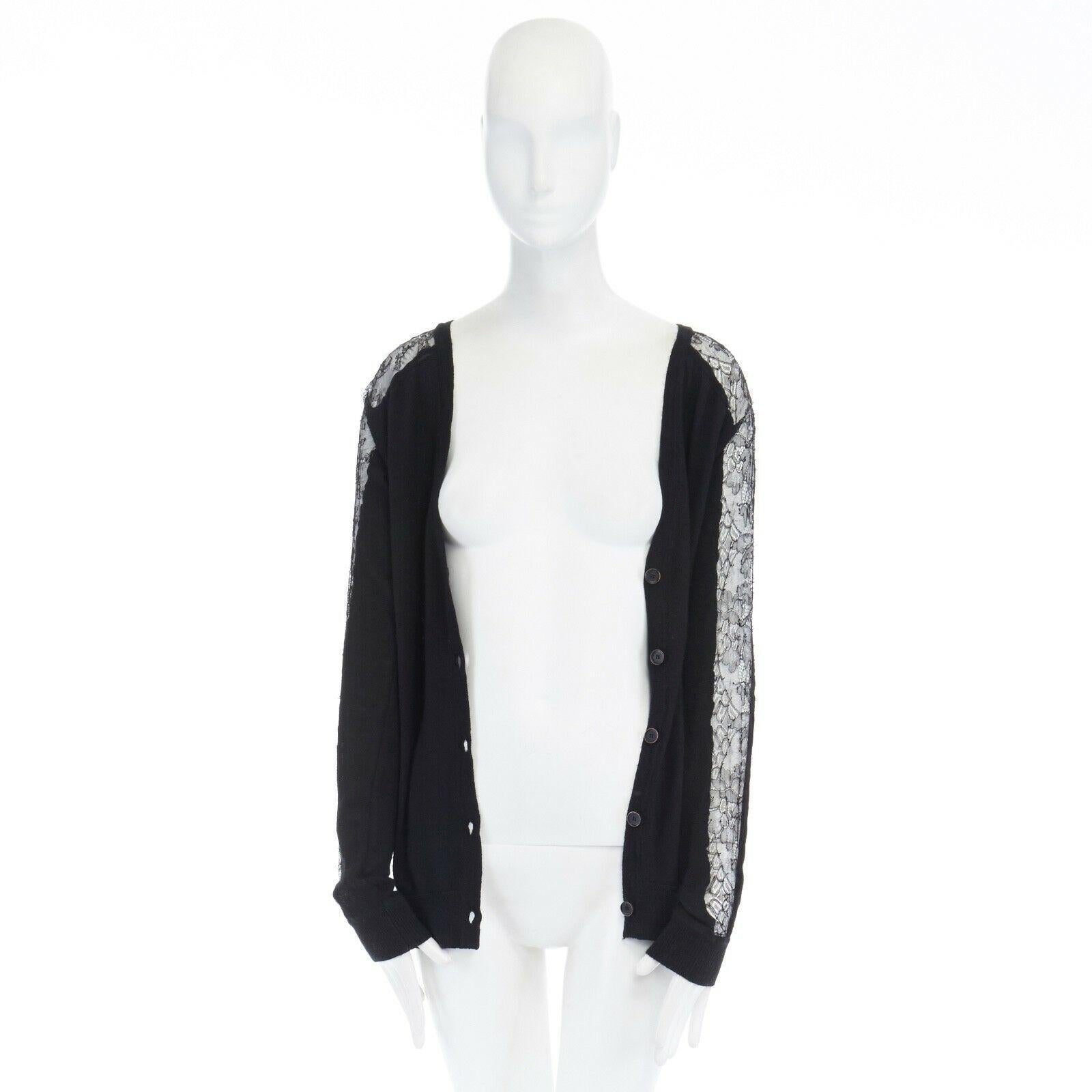 ANNE VALERIE HASH black sheer lace sleeves V-neck button front cardigan XS Reference: WEYN/A00233 
Brand: Anne Valerie Hash 
Designer: Anne Valerie Hash 
Collection: Fall Winter 20154 
Material: Polyamide 
Color: Black 
Pattern: Other 
Closure:
