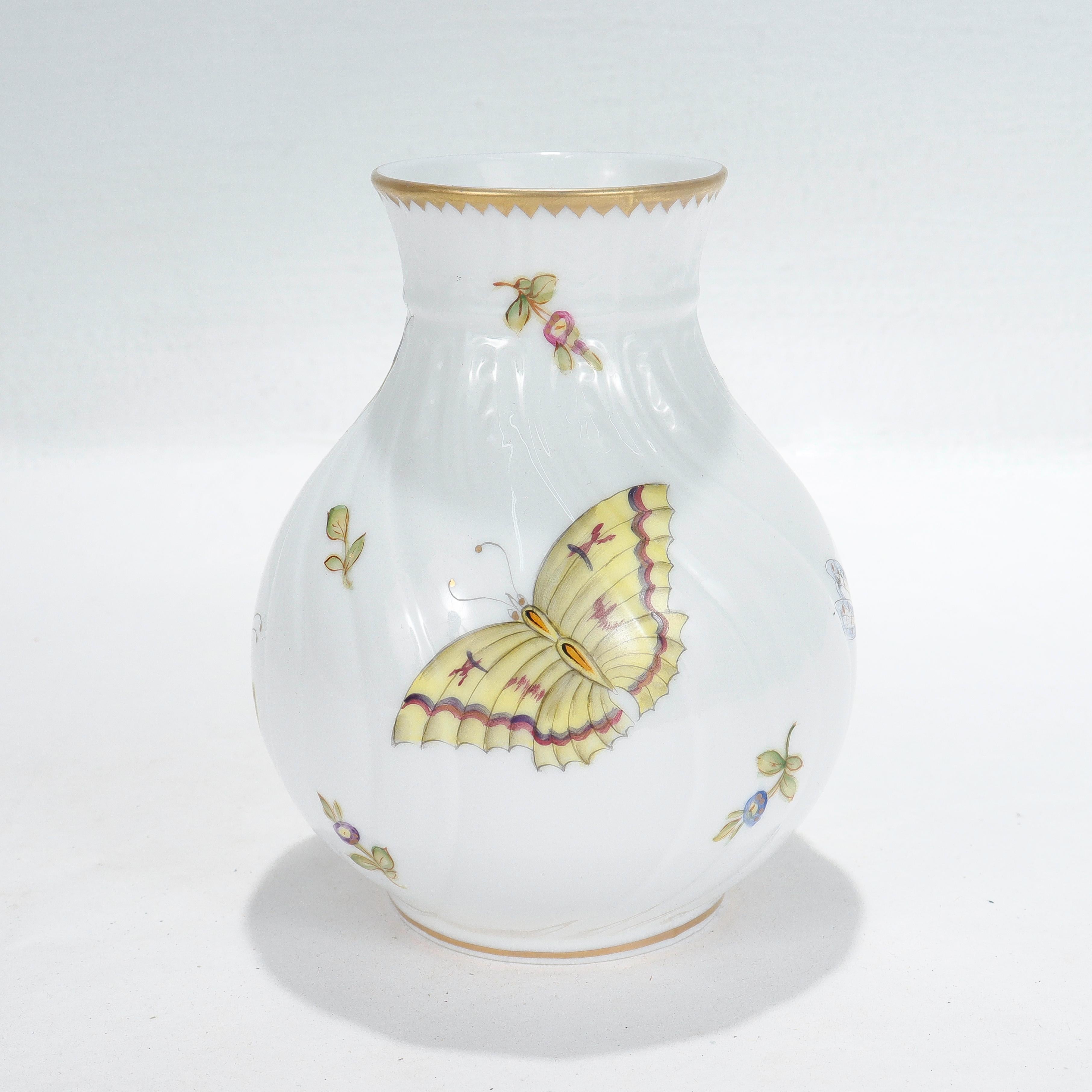 A fine porcelain vase.

By Anna Weatherly.

In the Budapest Spring pattern.

Model no. BL.23

Decorated with butterflies, insects, & flowers in the Herend style.

Simply a wonderful Hungarian porcelain vase!

Date:
21st Century

Overall