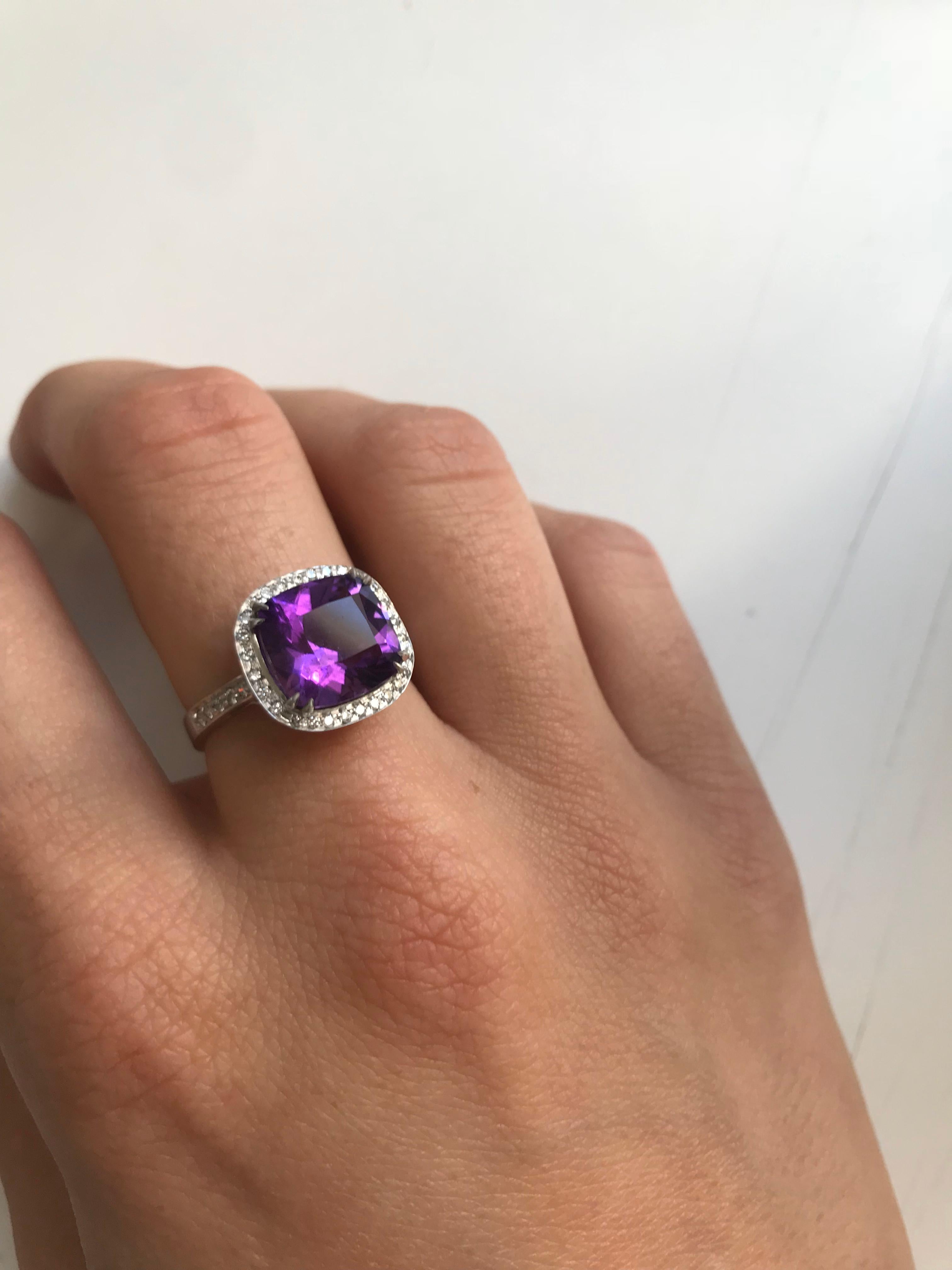 Handmade in our 150 year old Italian Workshop
3.67ct Amethyst
0.35ct White VVS-F Diamonds
18kt White Gold
Size US 7

In true Cocktail Ring style this Hand Cushion Cut Amethyst is surrounded by 28 Brilliant Cut White Diamonds and set in 18k White