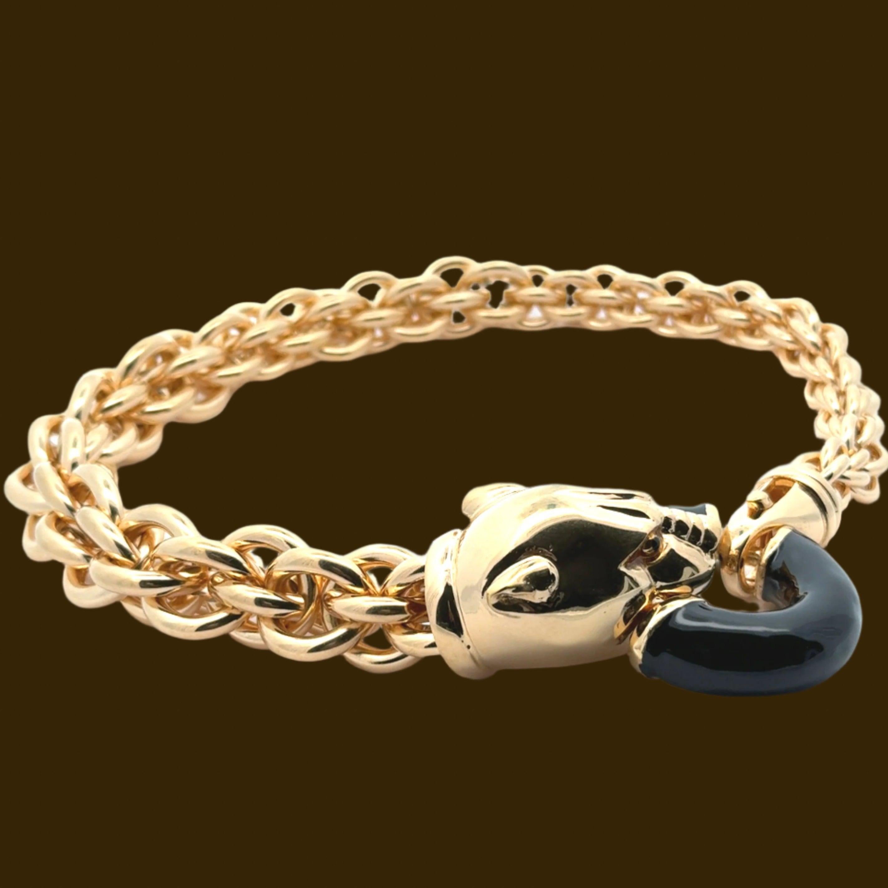 Expertly handcrafted in Italy, the Annibale Baldini Panther Statement Necklace exudes power and elegance. Featuring a stunning panther design with bold gold chain, this statement piece will elevate any outfit with its intricate craftsmanship and