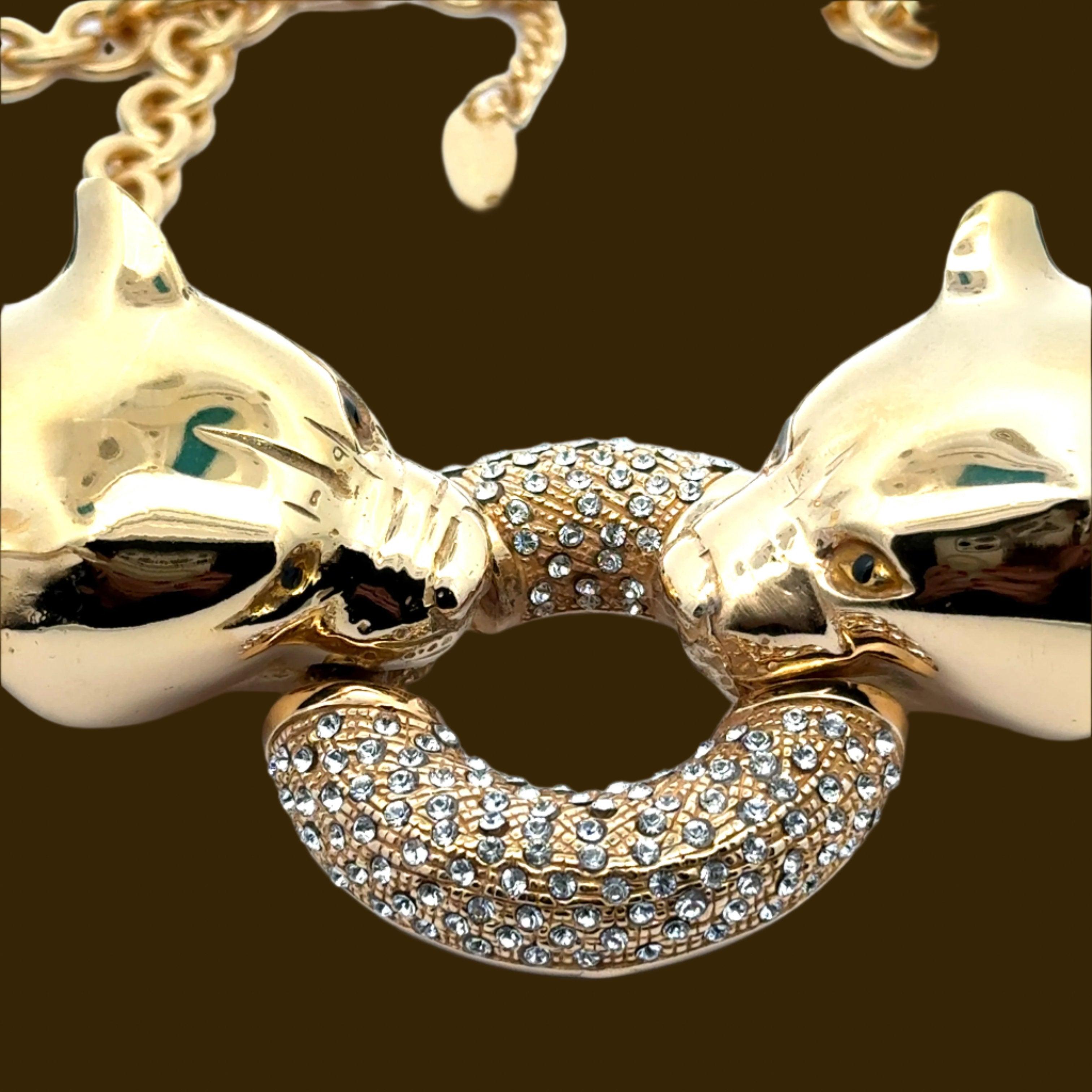 Expertly handcrafted in Italy, the Annibale Baldini Panther Statement Necklace exudes power and elegance. Featuring a stunning panther design with a ring of Swarovski crystal, this statement piece will elevate any outfit with its intricate