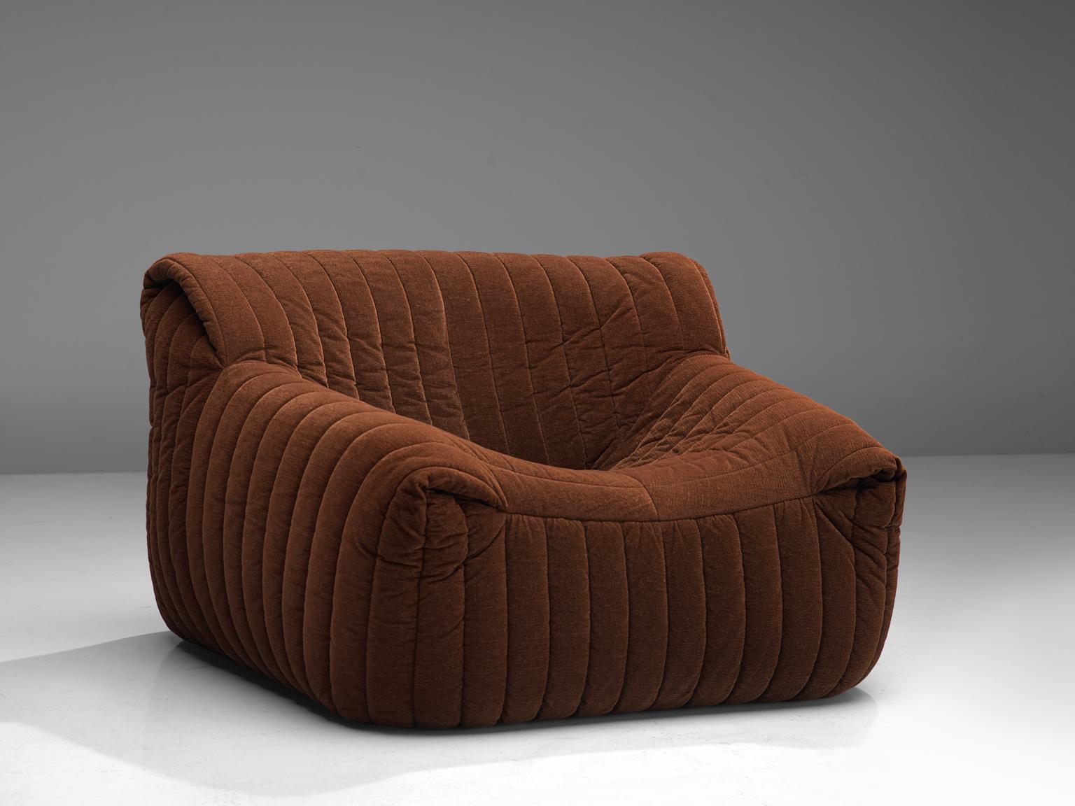 Annie Hiéronimus for Cinna (Ligne Roset), lounge chair model 'Sandra', fabric, France, circa 1977.

This comfortable and grand 'Sandra' lounge chair, is designed by Annie Hiéronimus. 
This model features a solid base with a rounded, bulky seat