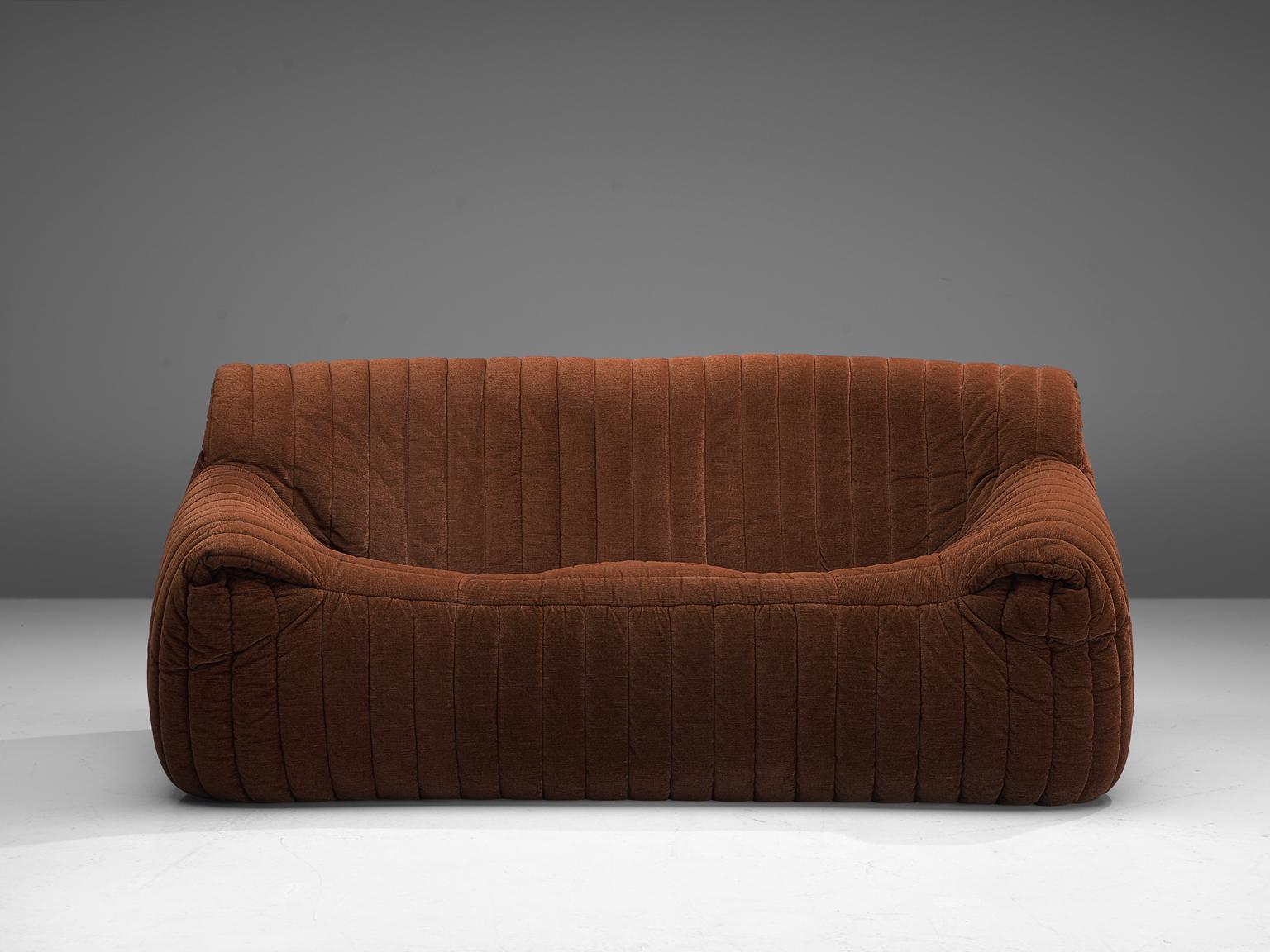 Annie Hiéronimus for Cinna (Ligne Roset), sofa model 'Sandra', fabric, France, circa 1977.

This comfortable and grand 'Sandra' two-seat sofa is designed by Annie Hiéronimus. This model features a solid base with a rounded, bulky seat and a high