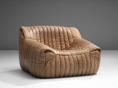 Annie Hiéronimus 'Sandra' Loungesessel in Taupe Leder