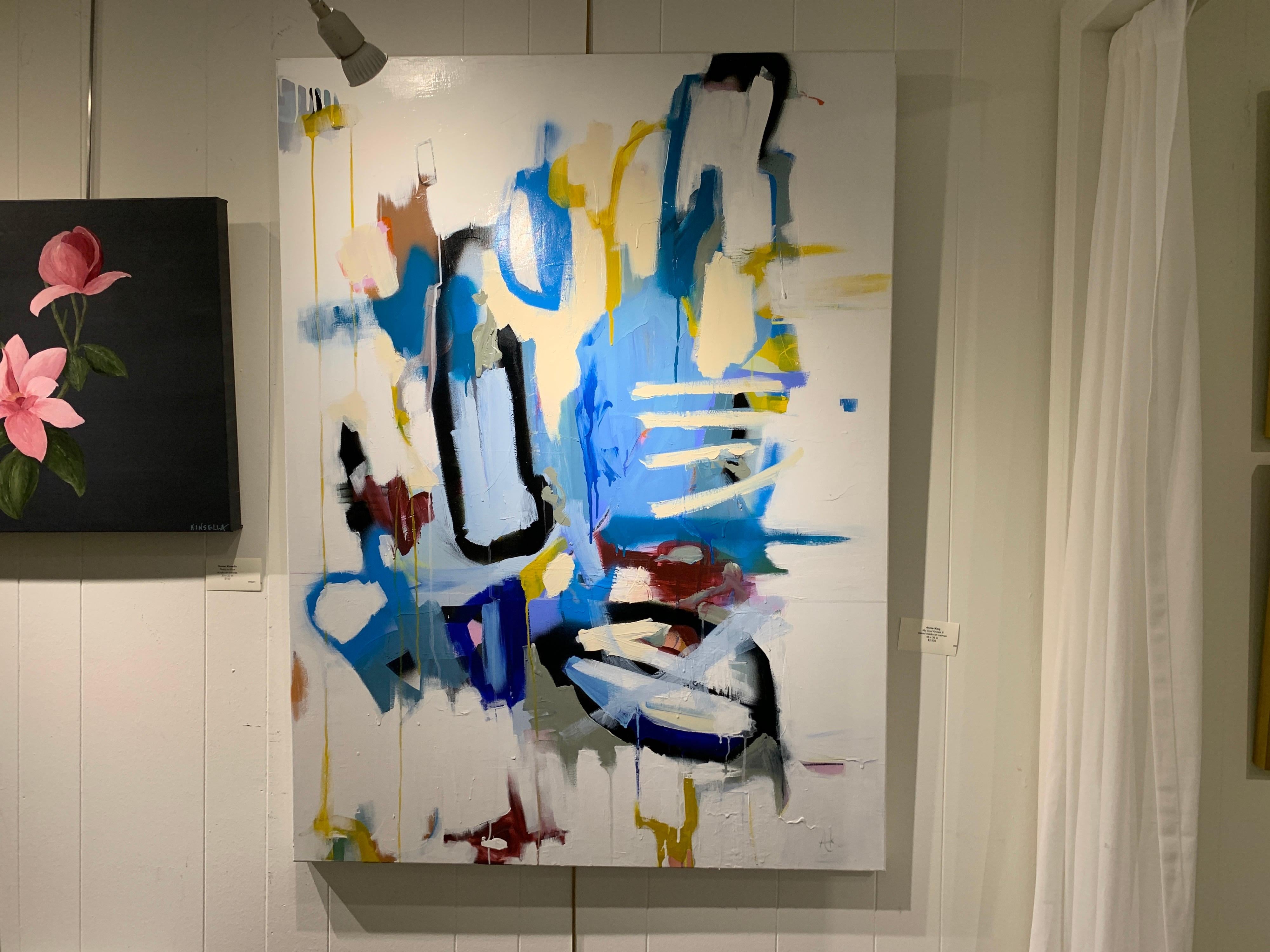 'My Soul Knows It' is a large mixed media on canvas abstract painting of vertical format created by American artist Annie King in 2020. Featuring a palette made of  beige, blue, white, black and soft yellow among other tones, this painting showcases