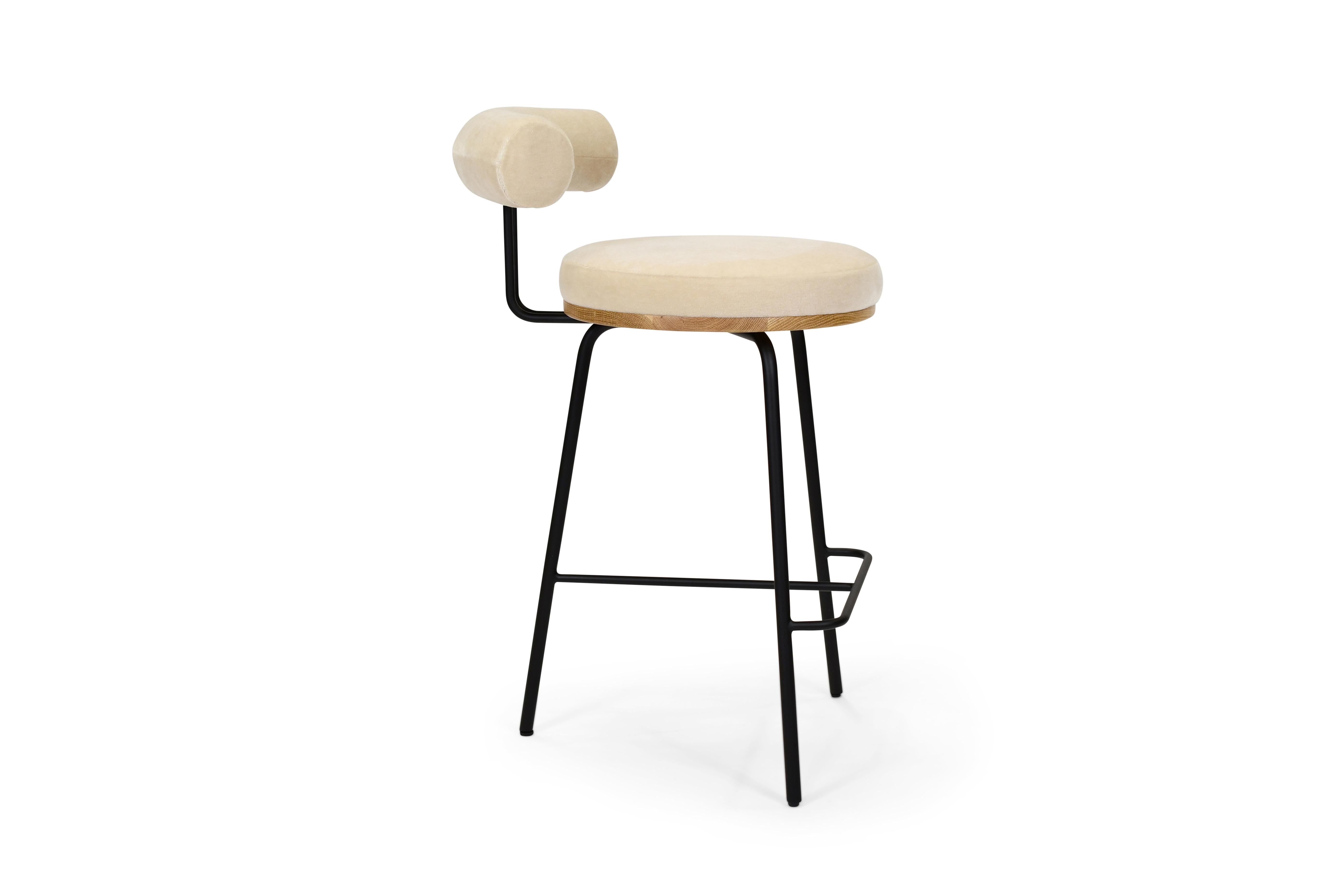 The Annie stool with its simple, modern form and refined tailoring details provides the right balance between utility and sophistication. Carefully considered for ergonomics, beauty, and performance. The upholstered seat and flowing curved back lend