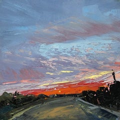 "Homeward Bound" Blue and orange road at sunset. 