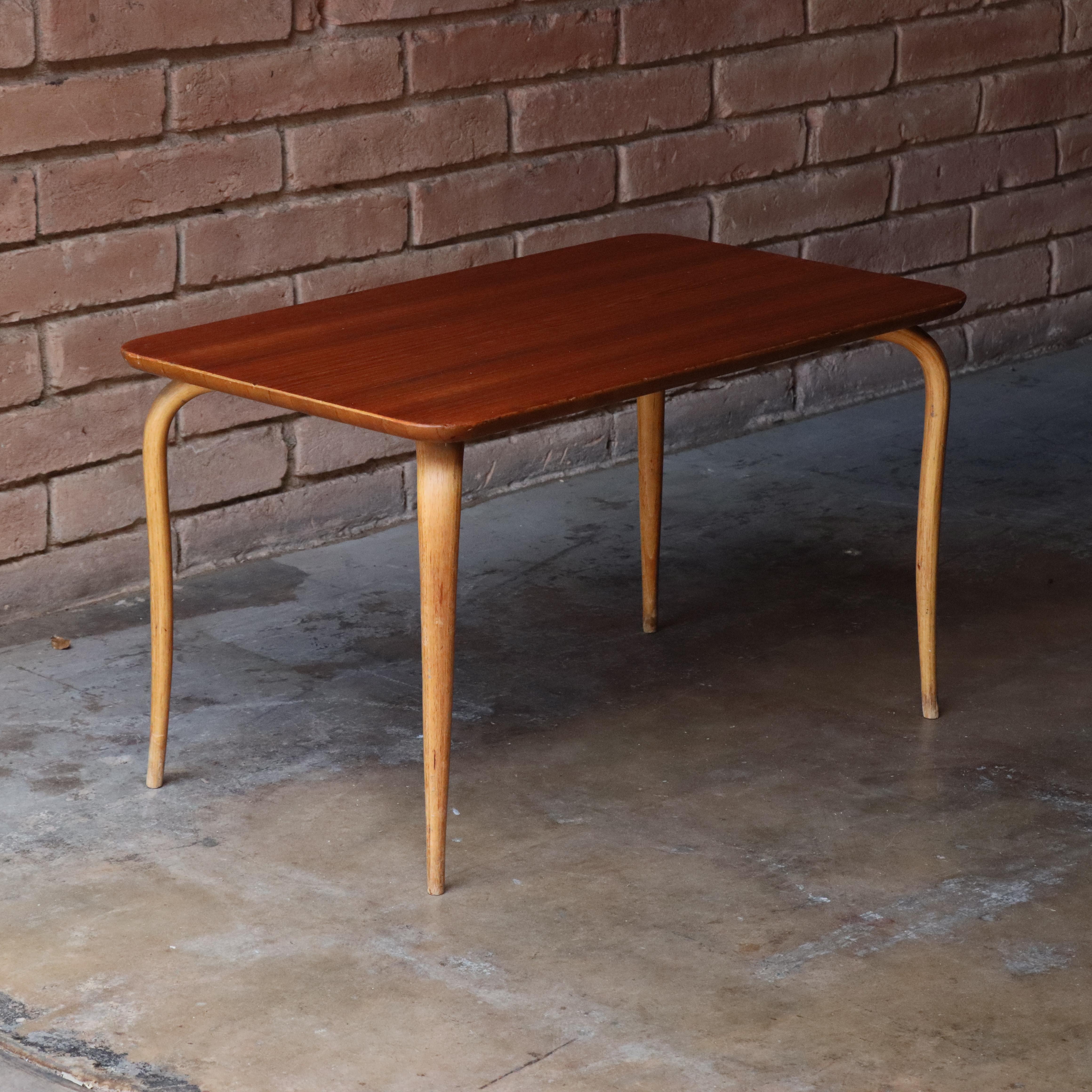 Annika table designed by Bruno Mathsson for Karl Mathsson, Sweden, 1950s 

Features a teak veneer top and sculptural beech bentwood legs. It is clear by the beautiful simplicity of this design that, inspired by the functionalist movement, Mathsson