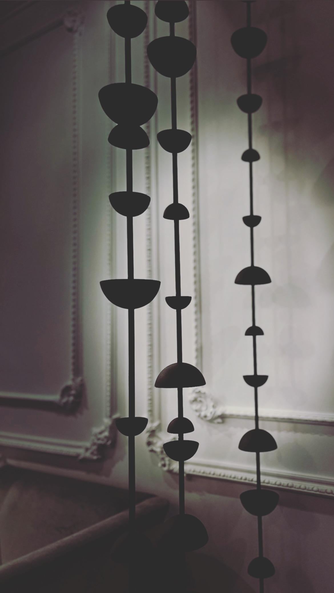 Modular sculptural divider, use one or link them together to create a beautiful installation. The sculpture itself has slight movement to create beautiful shadows.
Made from spun aluminum and steel , finished in either a powder coated Pyrite or