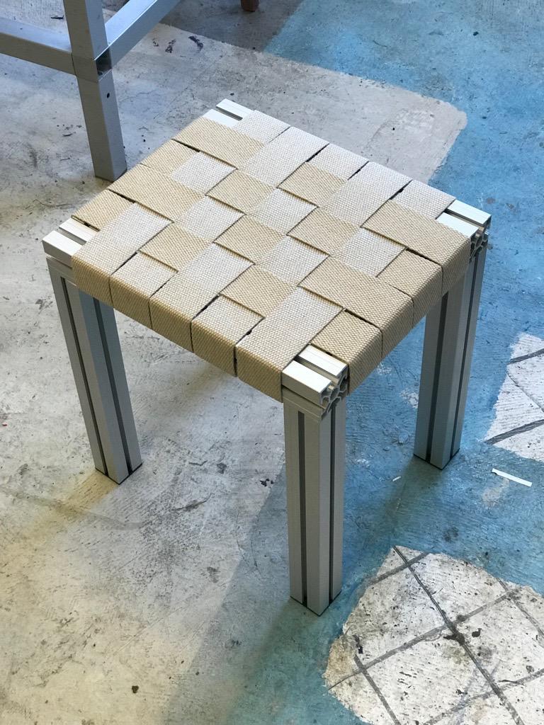 Anodized Grey and Flax Webbing wicker stool by Tino Seubert
Dimensions: D 41.2 x W 34.9 x H 45 cm.
Materials: Grey anodised aluminum extrusions, flax webbing.

Tino Seubert
When he first made his now signature wicker and aluminium stools and
