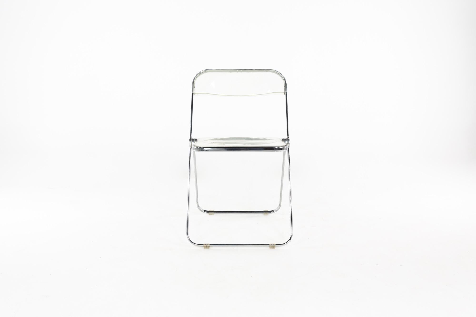 Anonima Castelli mid century Italian Lucite folding chair

Measures: This chair is 18.5 wide x 18.5 deep x 29.5 high, with a seat height of 18 inches

All pieces of furniture can be had in what we call restored vintage condition. That means the