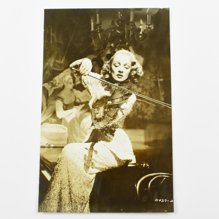 Unknown Portrait Photograph - Marlene Dietrich Playing Violin - Silver Gelatin Black and White Photograph