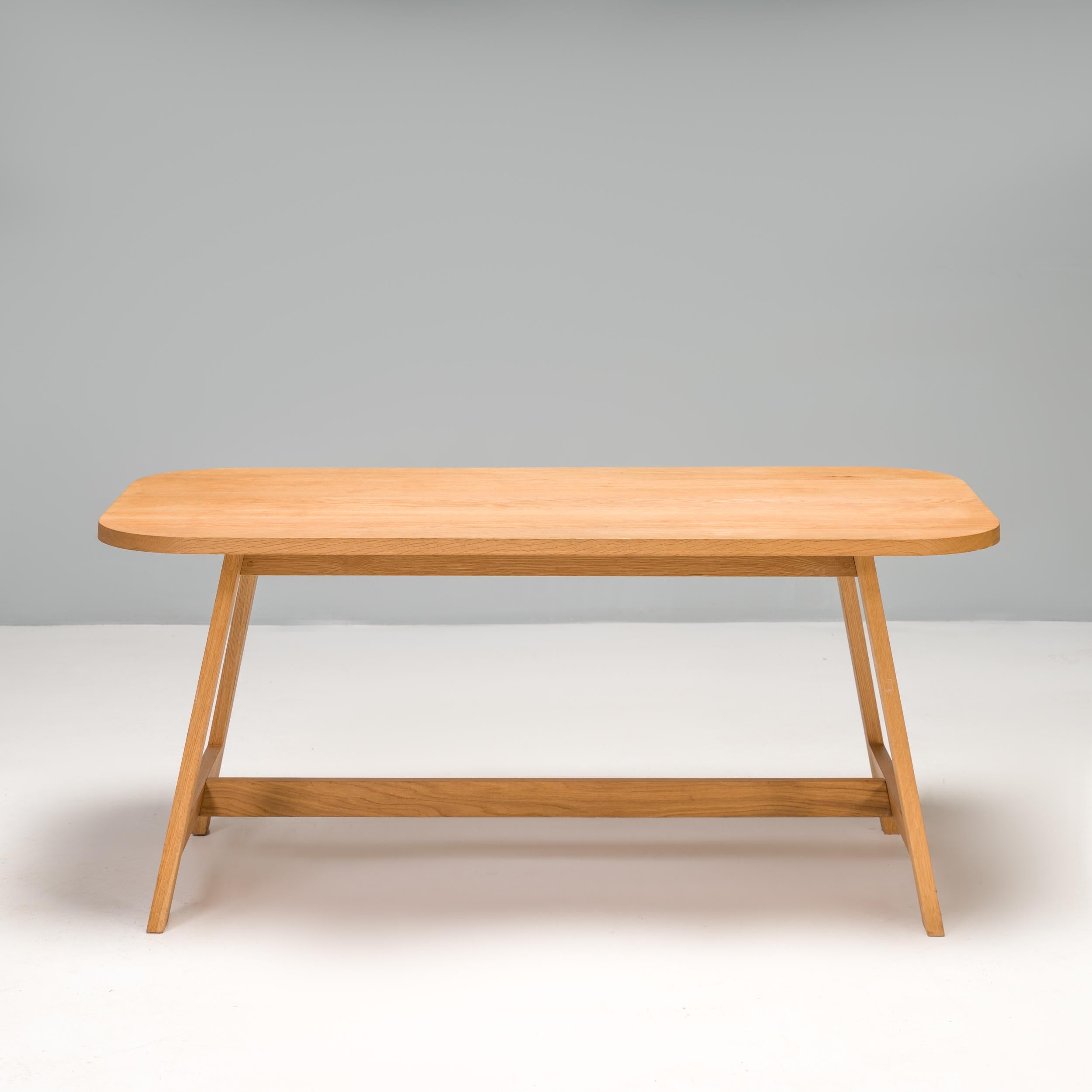 Founded in 2010, Another Country specialises in wooden furniture. The Three dining table was constructed in their Portugal workshop from sold certified oak wood.

The third series was inspired by marrying traditional Craft construction and