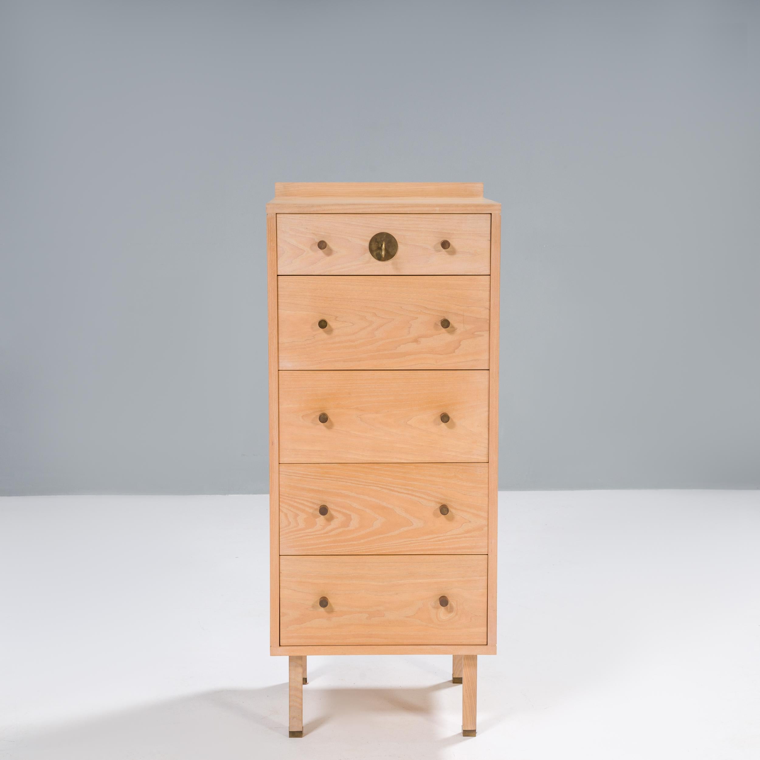Founded in 2010, Another Country specialises in wooden furniture. The Tallboy Two was constructed in their Portugal workshop from sold certified ash wood.

The tallboy storage offers a contemporary update on the traditional design with a white oil