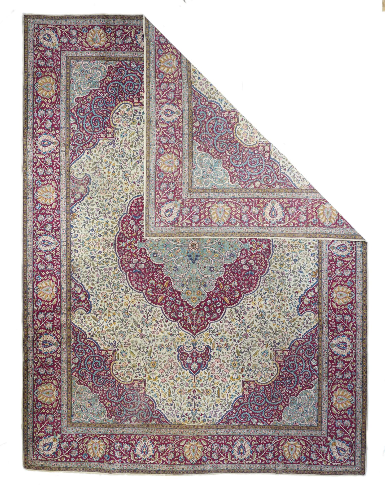 Kerman rug measures 9'1'' x 12'0''.