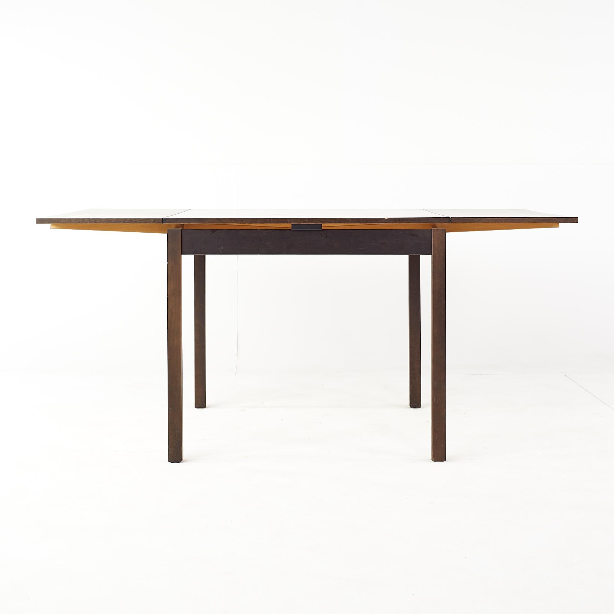 Late 20th Century Ansager Mobler Mid-Century Danish Walnut Hidden Leaf Dining Table For Sale