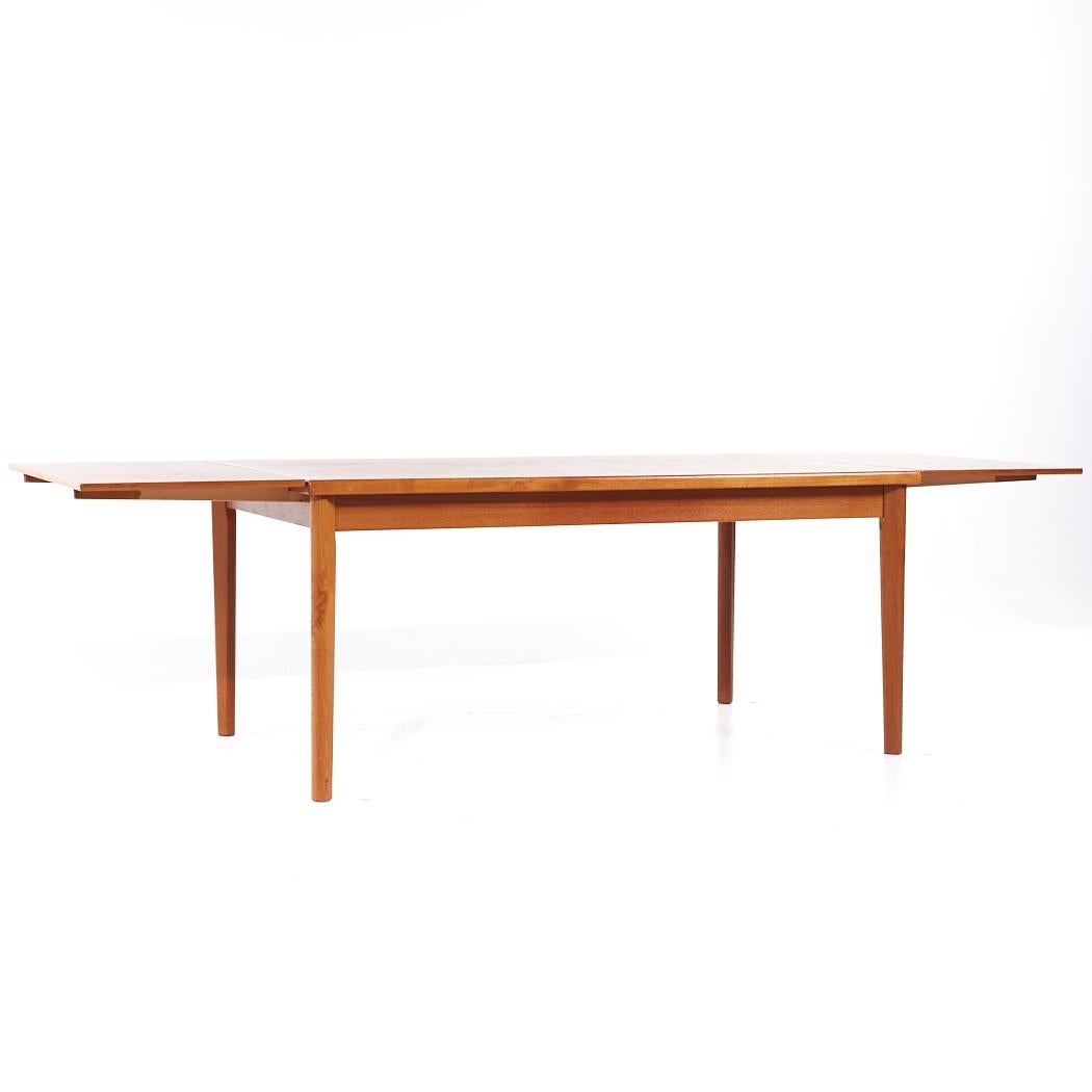 Late 20th Century Ansager Mobler Style Mid Century Teak Hidden Leaf Dining Table For Sale