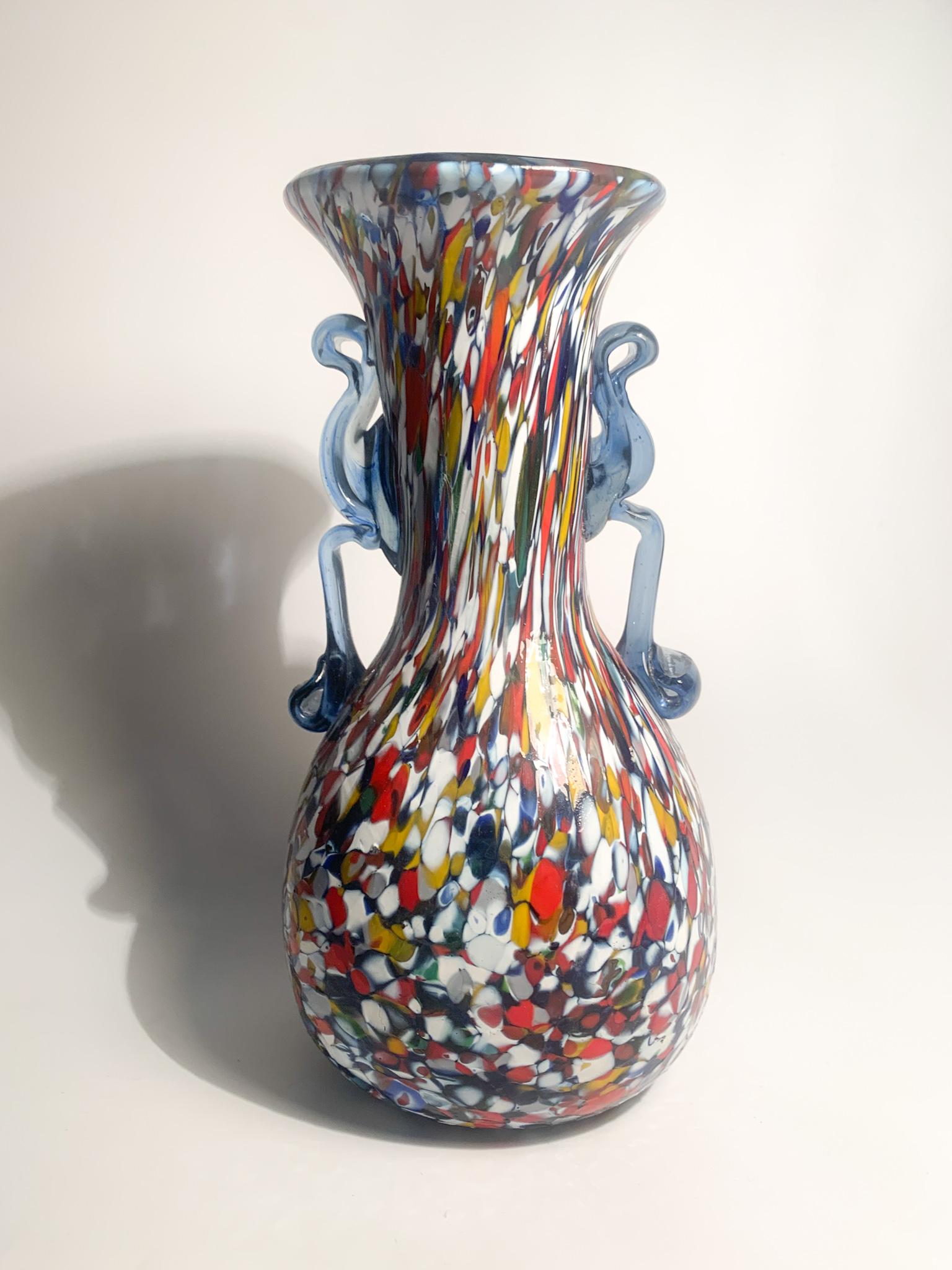 Vase in multicolored Murano glass with handles, hand blown with fusion of moray eels in the 1940s.

Ø cm 10 h cm 22