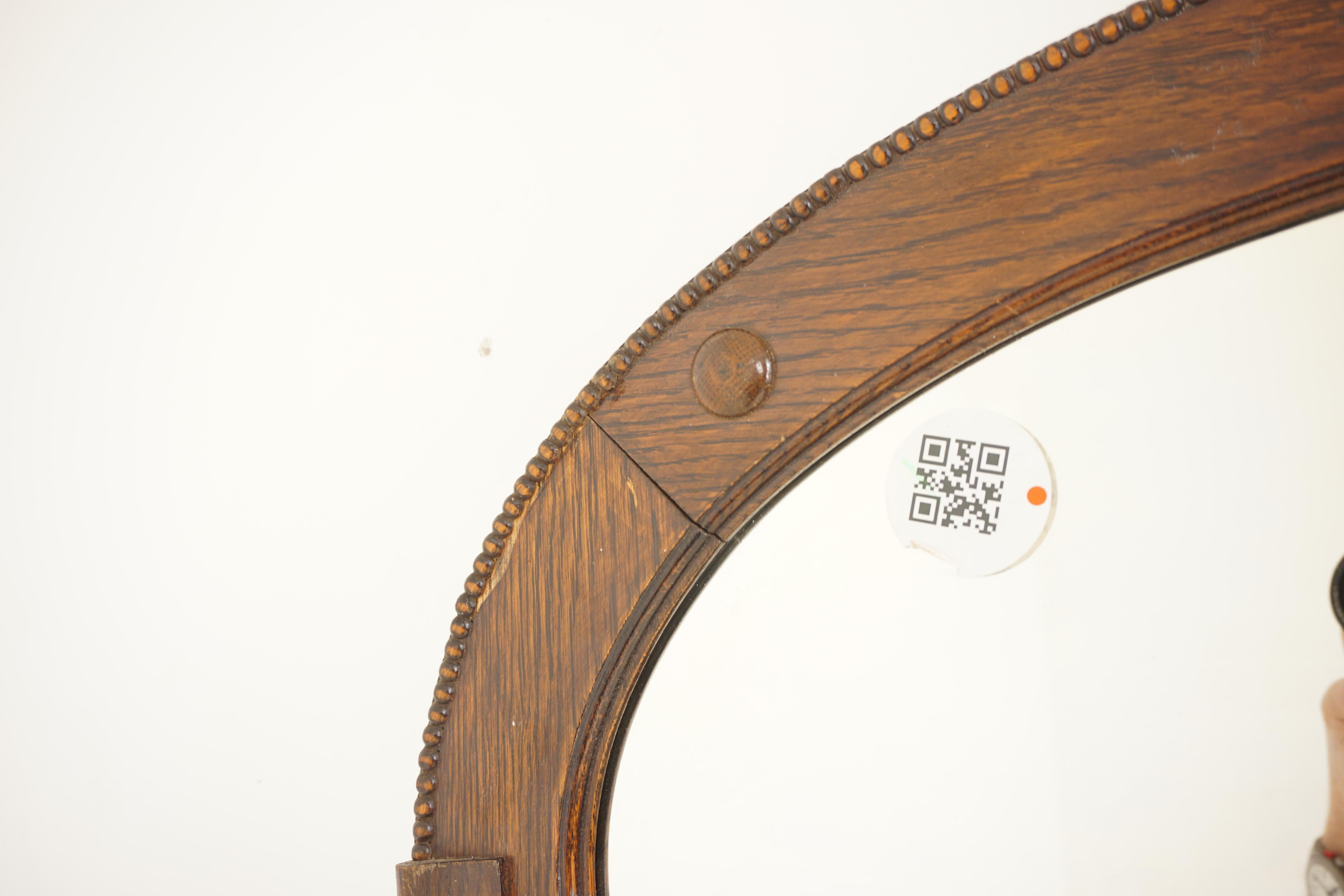 Ant. Oak Oval Bevelled Wall Mirror, Scotland 1900, H812

Scotland 1900
Solid Oak 
Original Finish 
Oak framed oval bevelled mirror with bobbin beading around the perimeter (some loss)
With from rondels on frame
Could be used vertically on