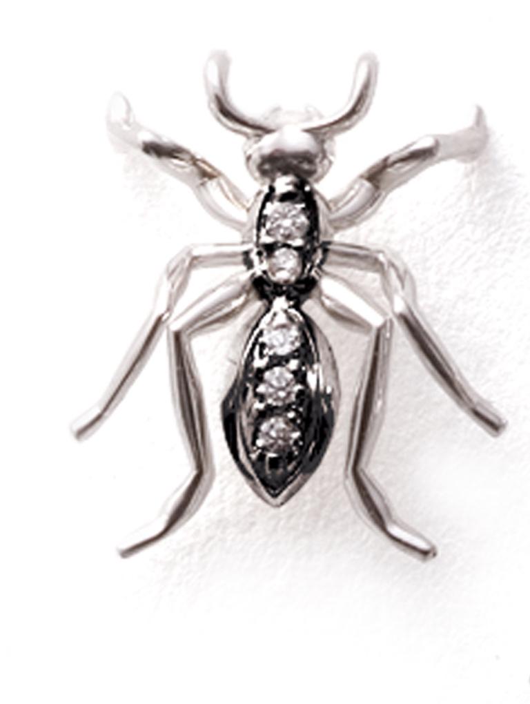 Make a statement with this sophisticated Ant Tie Tack. Crafted in 14k white gold black rhodium and adorned with five brilliant-cut round diamonds pave set, this limited edition piece is the perfect addition to any formal or business attire. The ant
