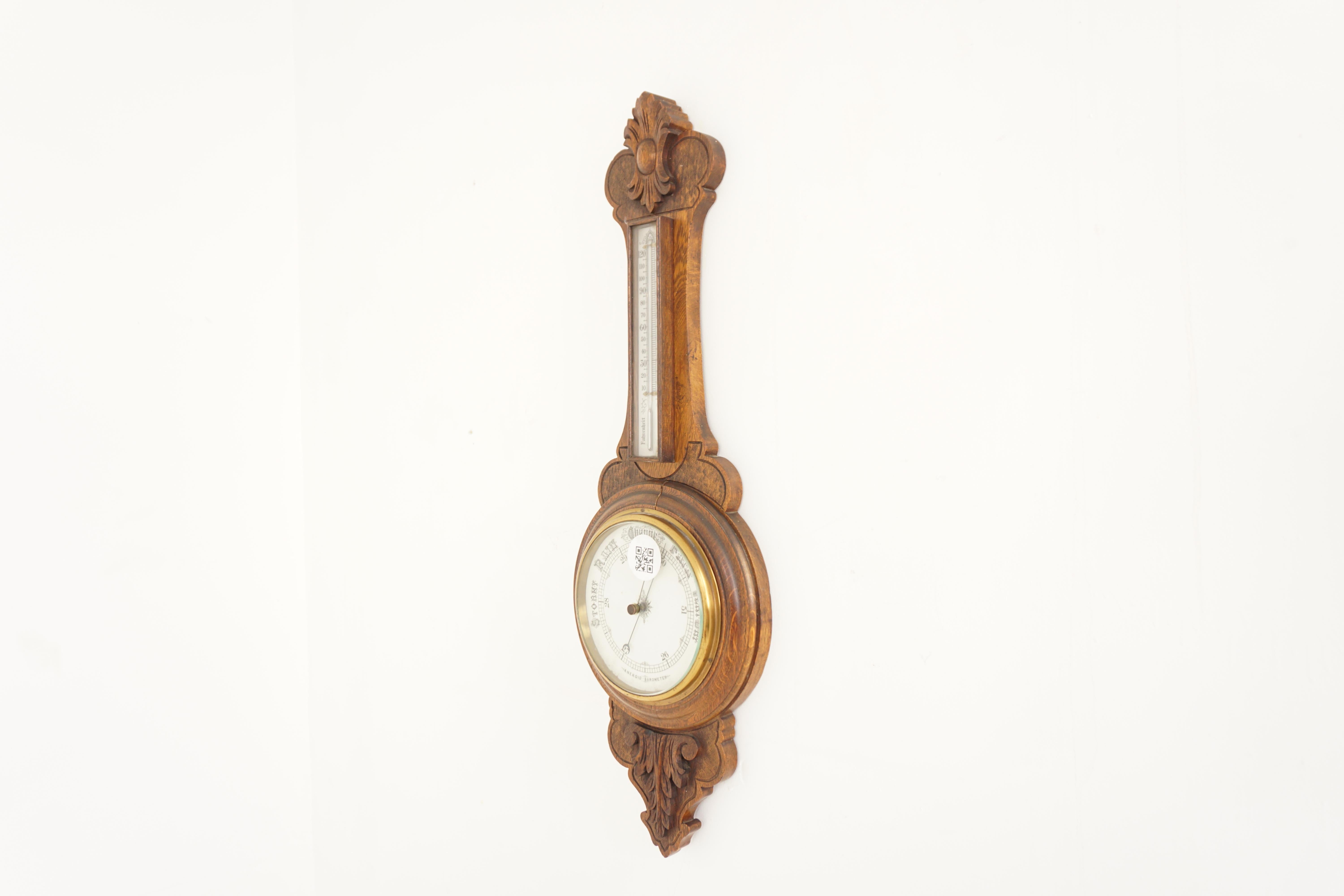 Ant. Victorian carved oak aneroid barometer, Scotland 1900, H854

Scotland 1900
Solid oak
Original finish
Oak carved floral carving on top and bottom
Barometer has a thermometer which is held in an oak glass fronted case
The porcelain dial is