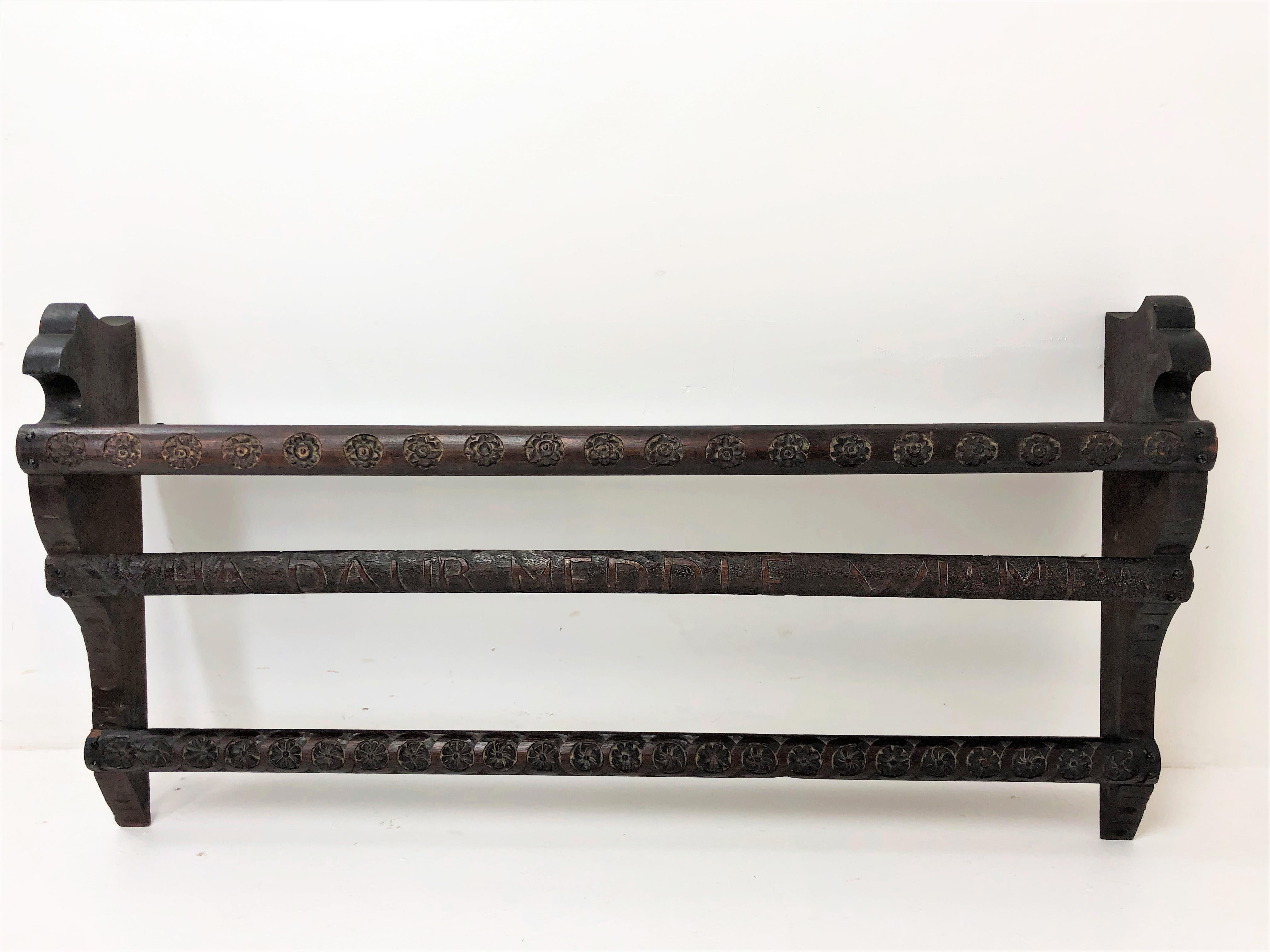 Antique Victorian carved oak plate rack, wall rack, 2 plate shelves, Scotland 1880, H795

Scotland 1880
Solid Oak
Original Finish
Carved ends
Crisp carving done with flowers and in Scottish saying 