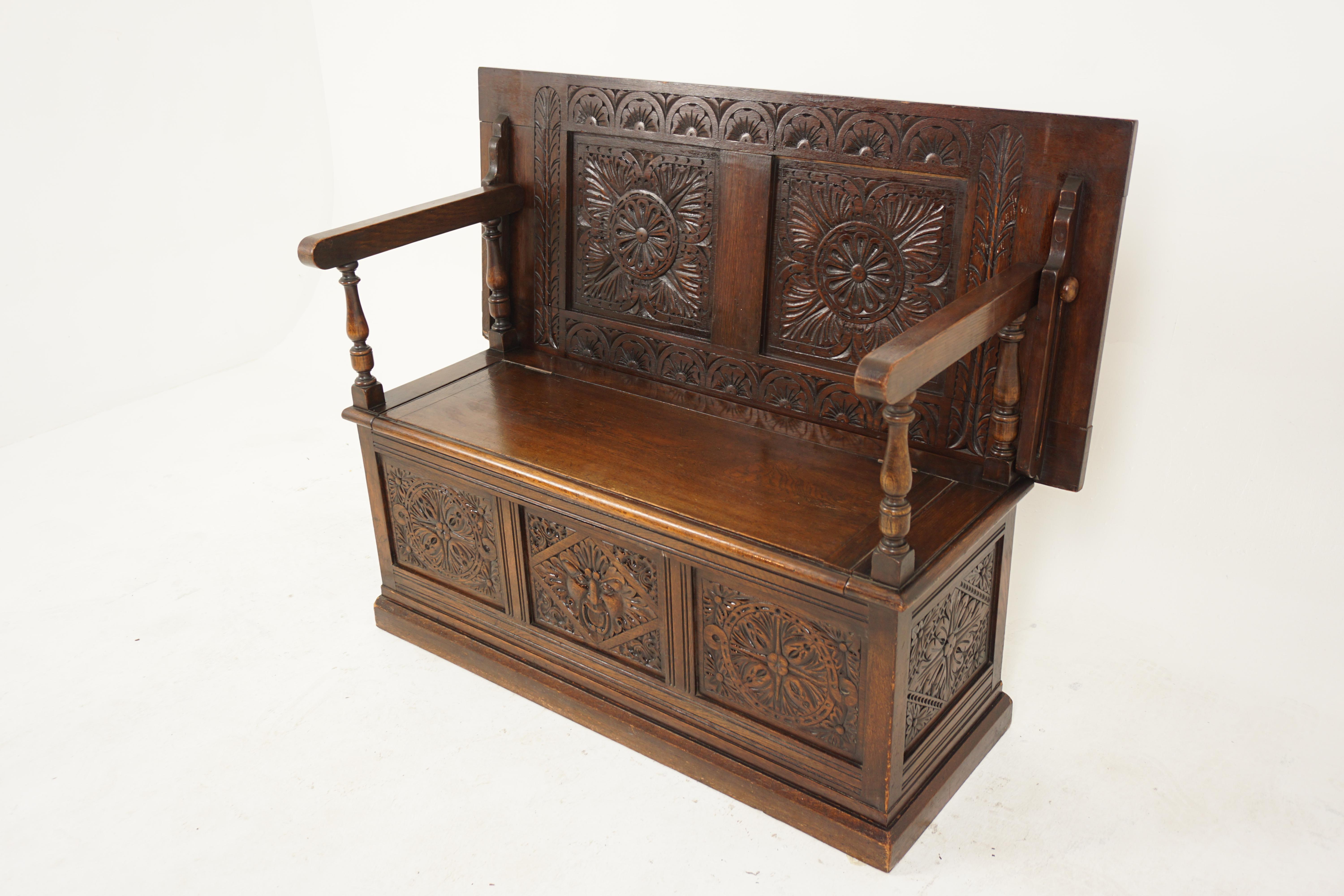 Antique Victorian Gothic Style Green Man Oak Monks Bench Hall Seat, Scotland 1890, H785

England 1890
Solid Oak 
Original Finish 
With a heavily carved back
Supported by oak supports and arm rests
The back folds down to form a table
This has