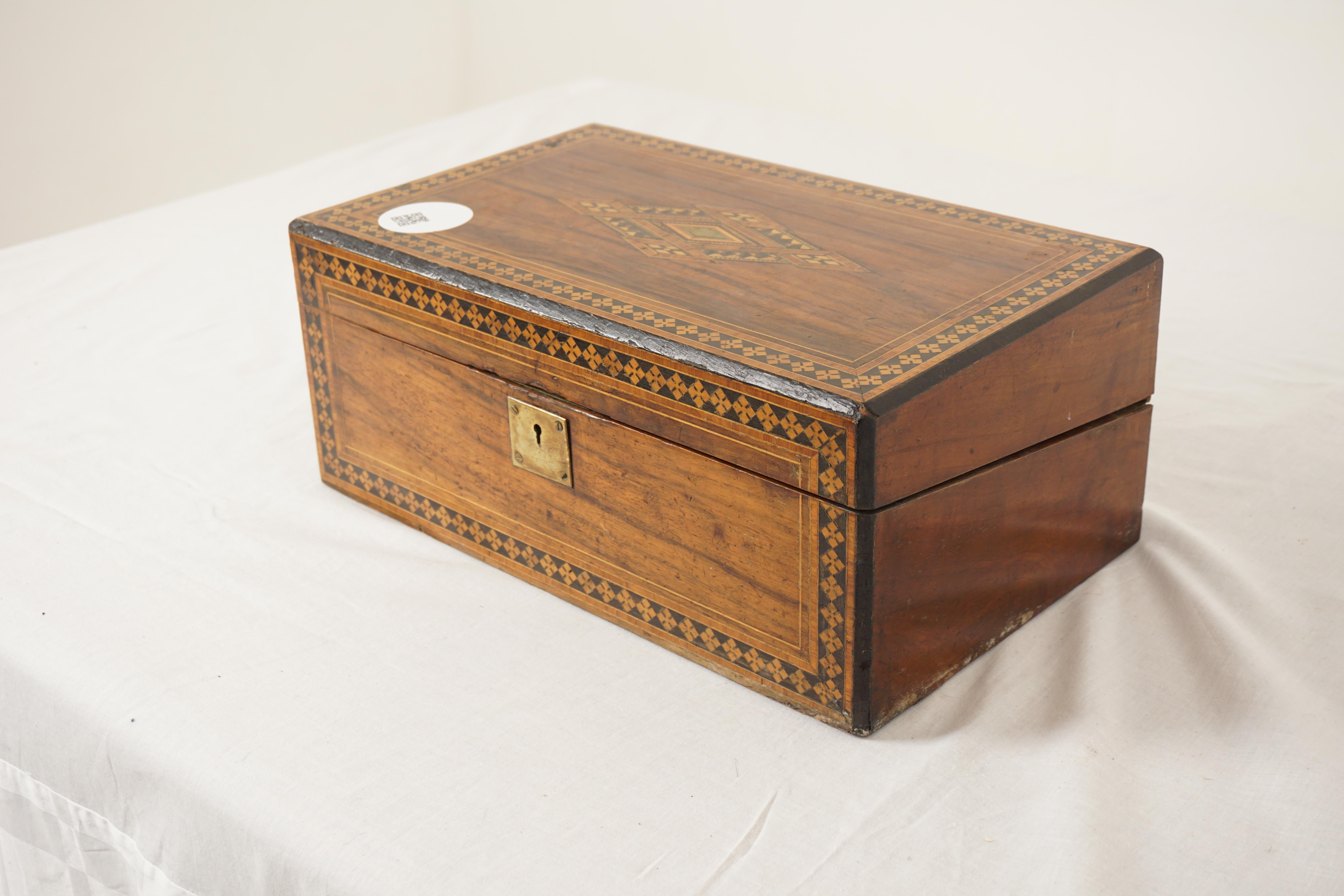 Ant. Victorian Inlaid Turnbridge Ware Writing Box, Scotland 1870, H1036

Scotland 1870
Mixed Woods
Original Finish
Heavily inlaid top and front with brass plate
Opens to reveal a pull out writing slope with lift up pen hold, space for two