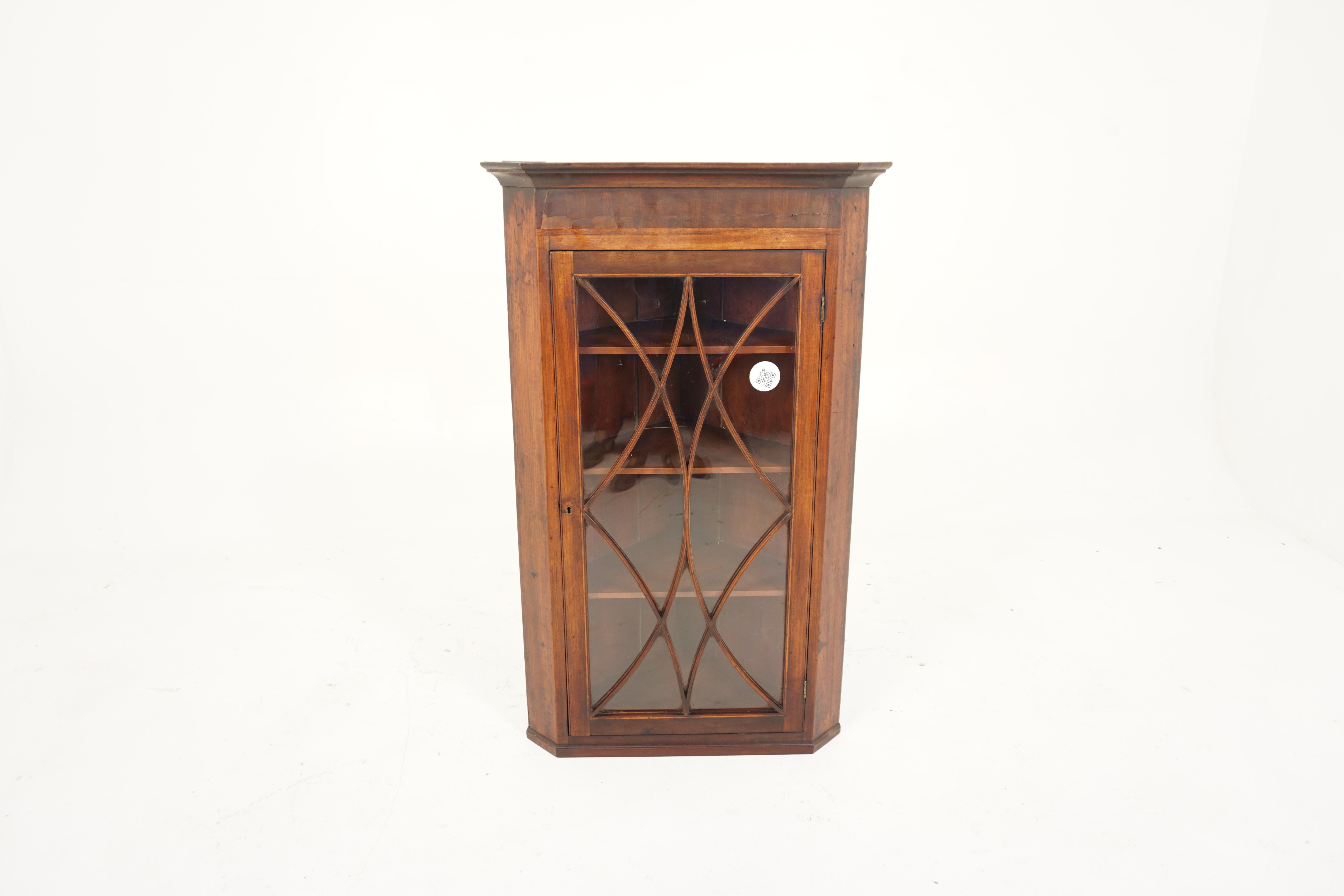 Ant. Victorian walnut inlaid wall hanging corner cabinet, display cabinet, Scotland 1820, H808

Scotland 1820
Solid walnut
Original finish
Overhang cornice on top
Single glass door with mouldings to the front
Thirteen panes of glass
Opens to