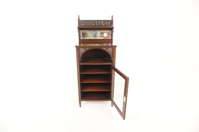 Antique Victorian walnut sheet music cabinet, display cabinet, Scotland 1880, H055

Scotland 1880
Solid walnut
Recently refinished
Carved gallery on top with shelf
Rectangular bevelled mirror below
Open cupboard with carved arched top
Single