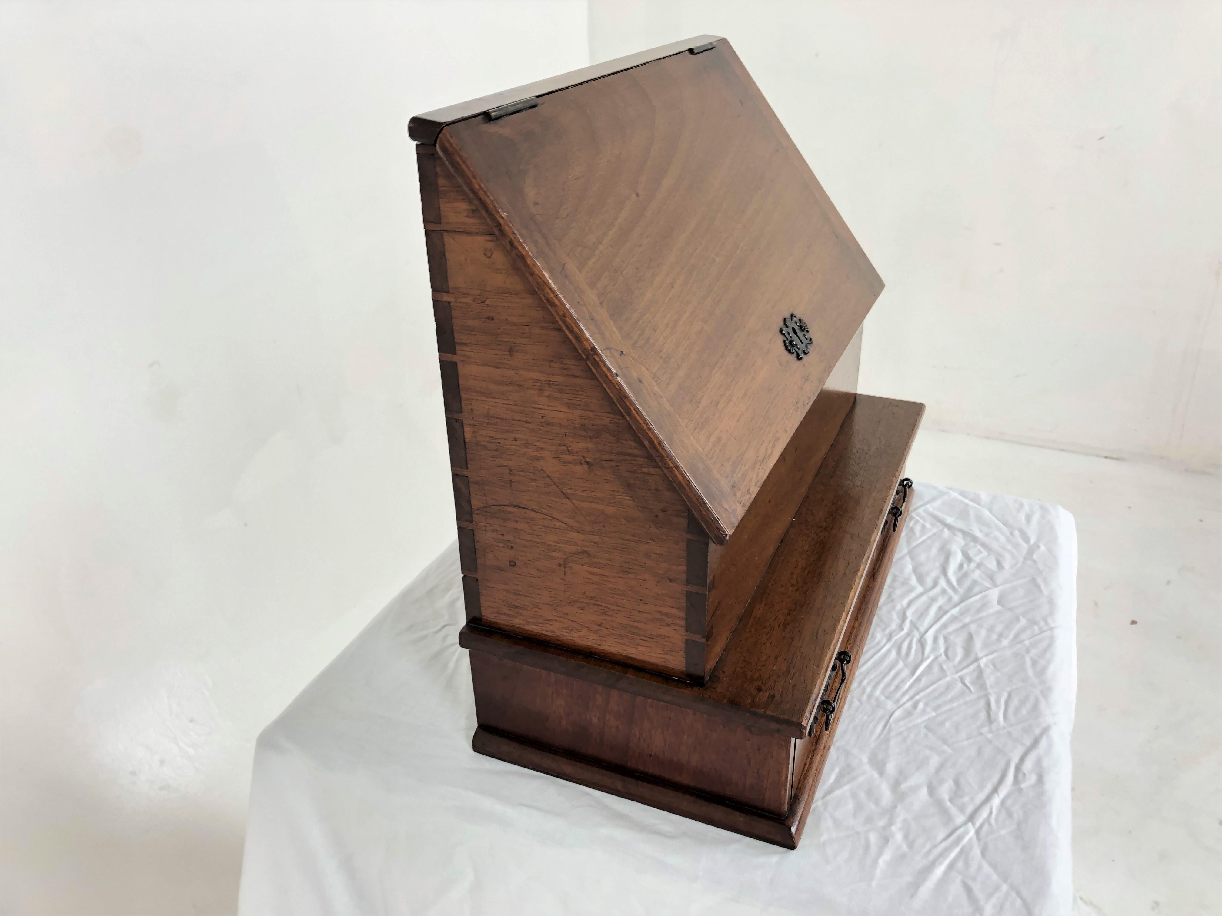 Antique Victorian walnut Art Nouveau stationary box with letter racks, Scotland 1905, H831

Scotland 1905
Solid Walnut
Original finish
Slanted top with dovetailed ends
Opens to reveal interior letter paper racks
Small shelf below
Single