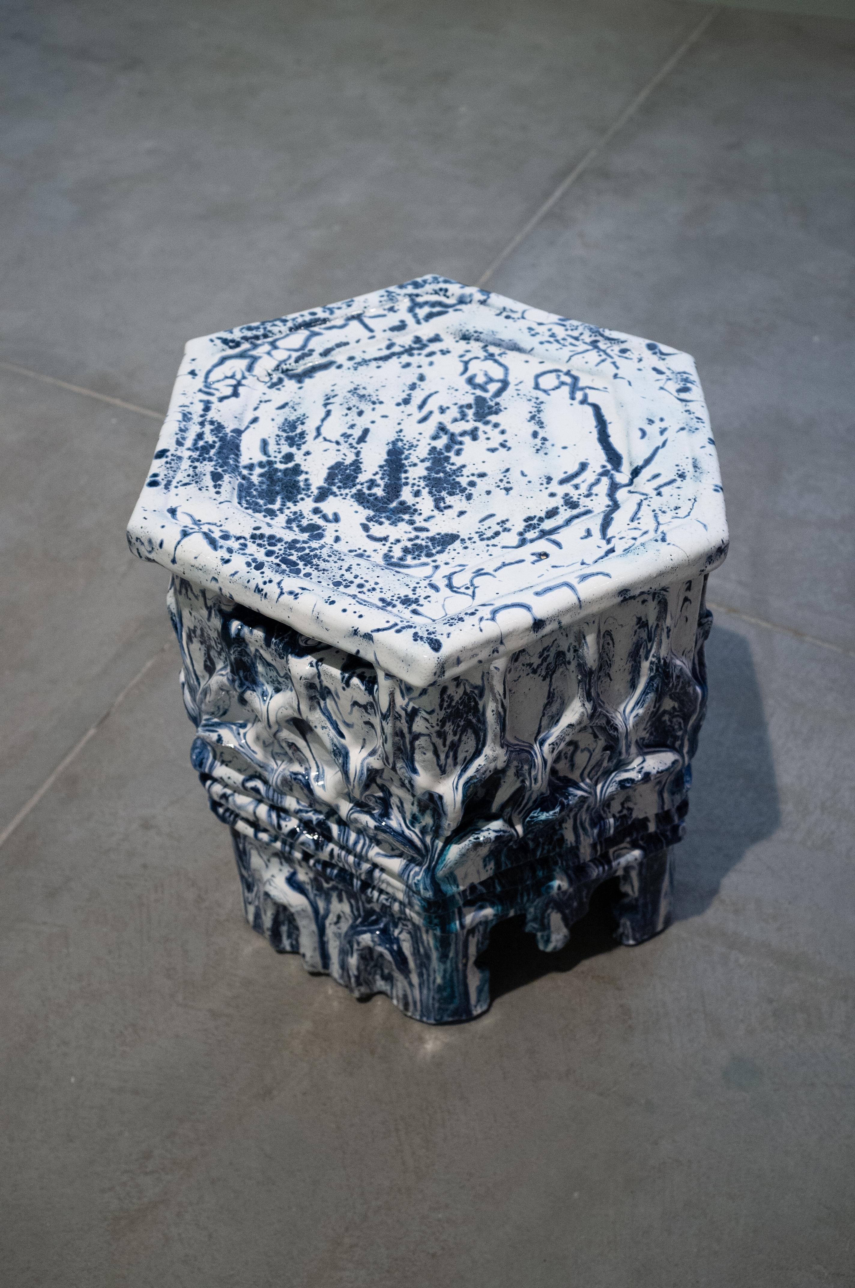 Antartigo table by Bela Silva 
Dimensions: 45 x 38 x 43,5 cm
Material: Stoneware
Color and Finish: Blue cobalt and white glaze 

Bela Silva was born in Lisbon, Portugal, and studied at:

Porto and the Lisbon Fine Arts Schools in