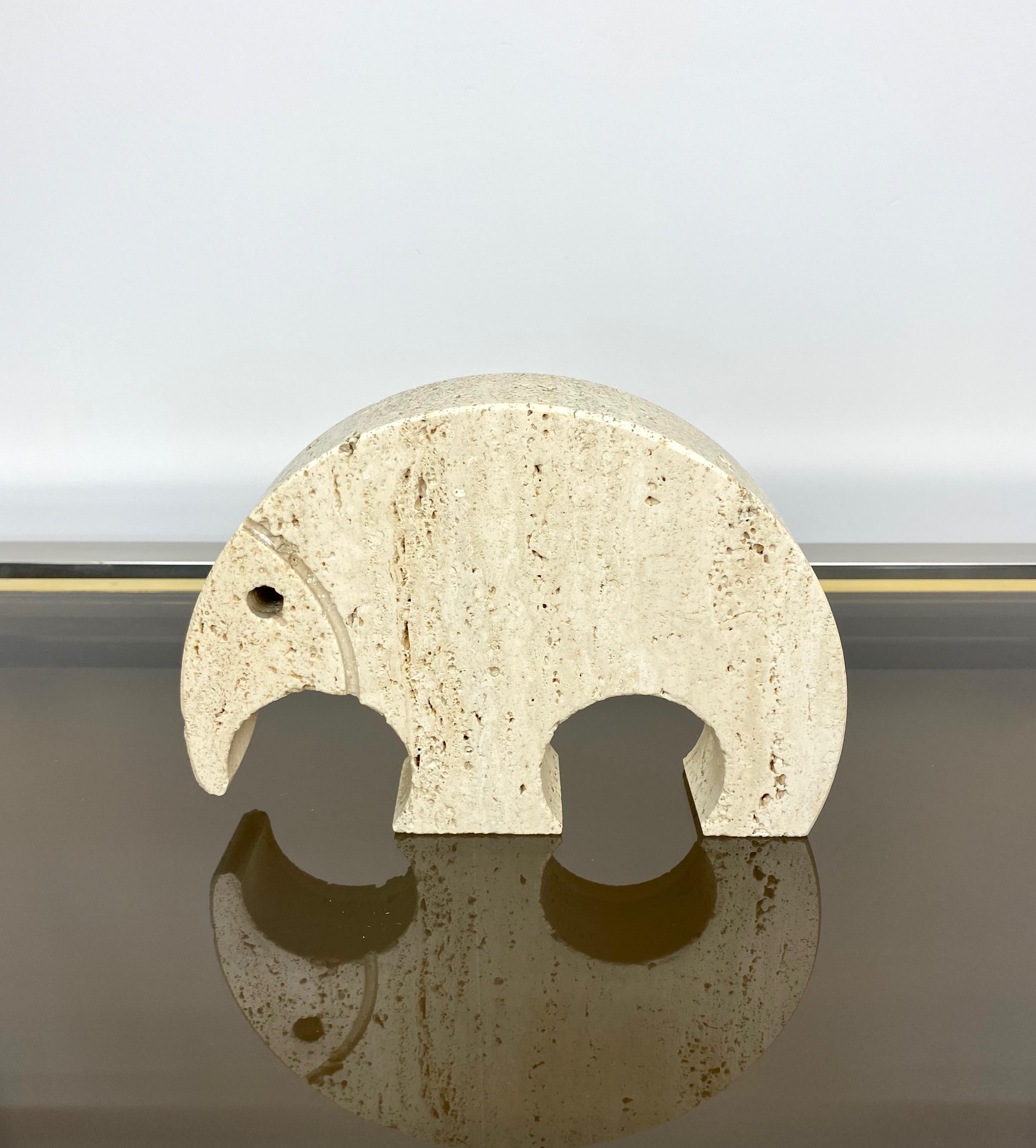 Anteater sculpture paperweight in travertine marble by Fratelli Mannelli, Italy, 1970s. 
The original label, citing 