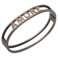 Anteo Manschettenarmband aus Titan und 18 Karat Roségold mit Fassung