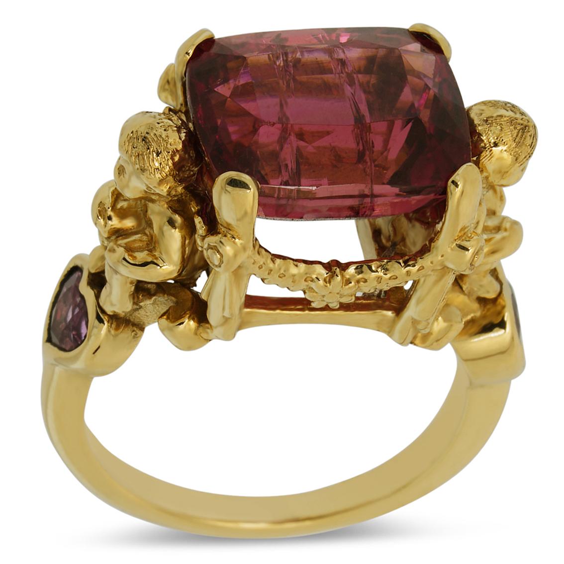 ANTEROS RING

Exquisitely handcrafted in 9kt yellow gold this heavenly ring features a gorgeous cranberry colored rubellite tourmaline aloft a signature William Llewellyn Griffiths garland setting decorated with fine floral details. Measuring 13mm