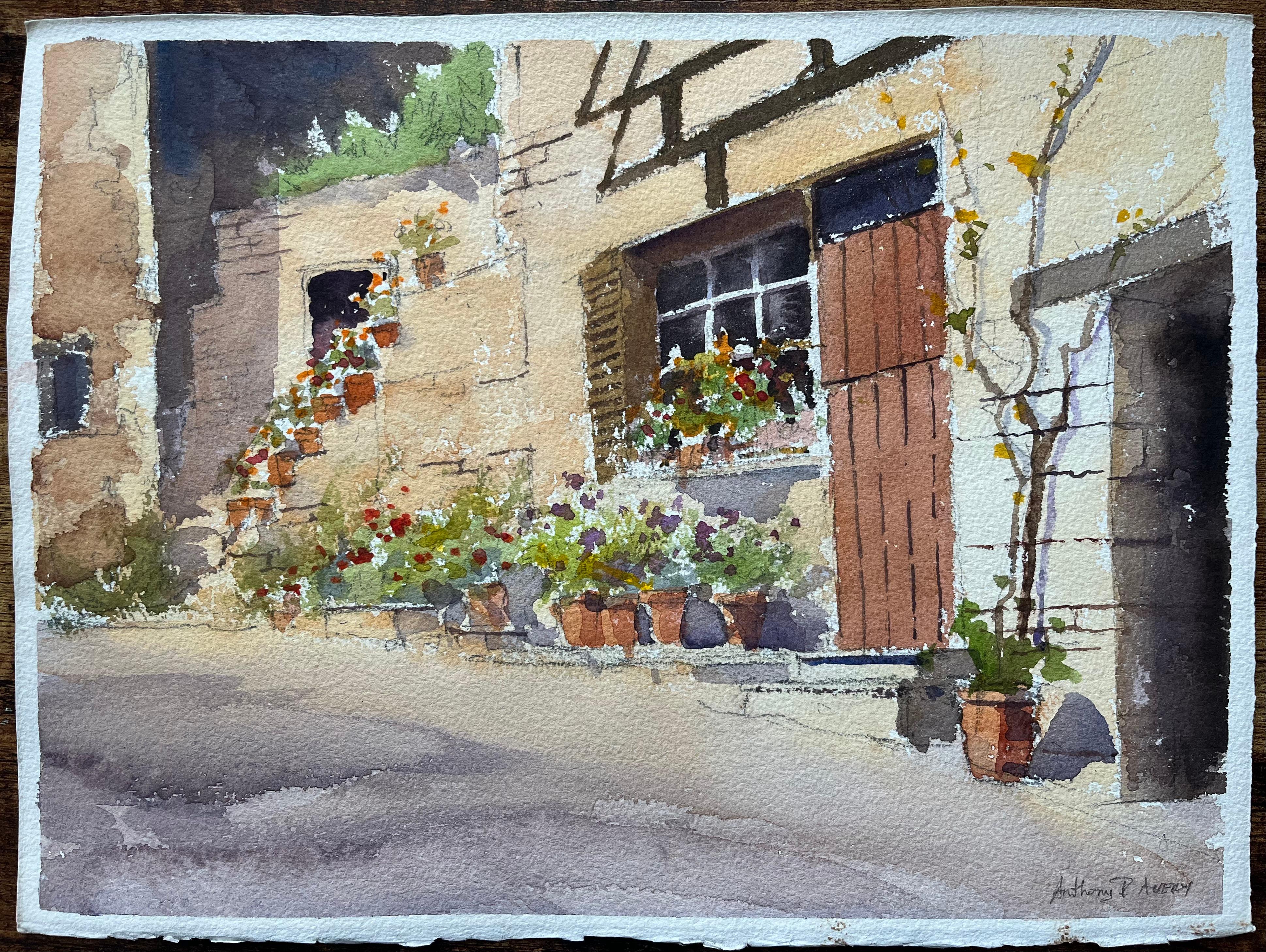 Britischer Impressionist Aquarell eines Blumen gesäumten Hofes mit rustikalem Charme – Painting von Anthony Avery